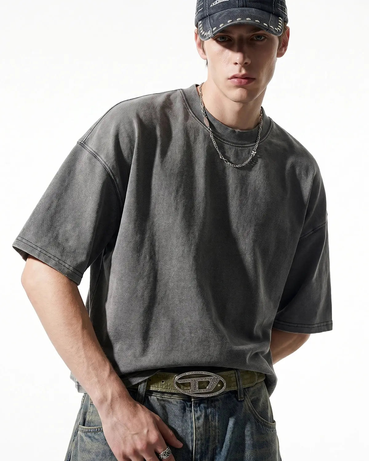 Distressed boxy washed T-shirt from Inflation Streetwear, featuring a vintage, worn-in look and relaxed fit.