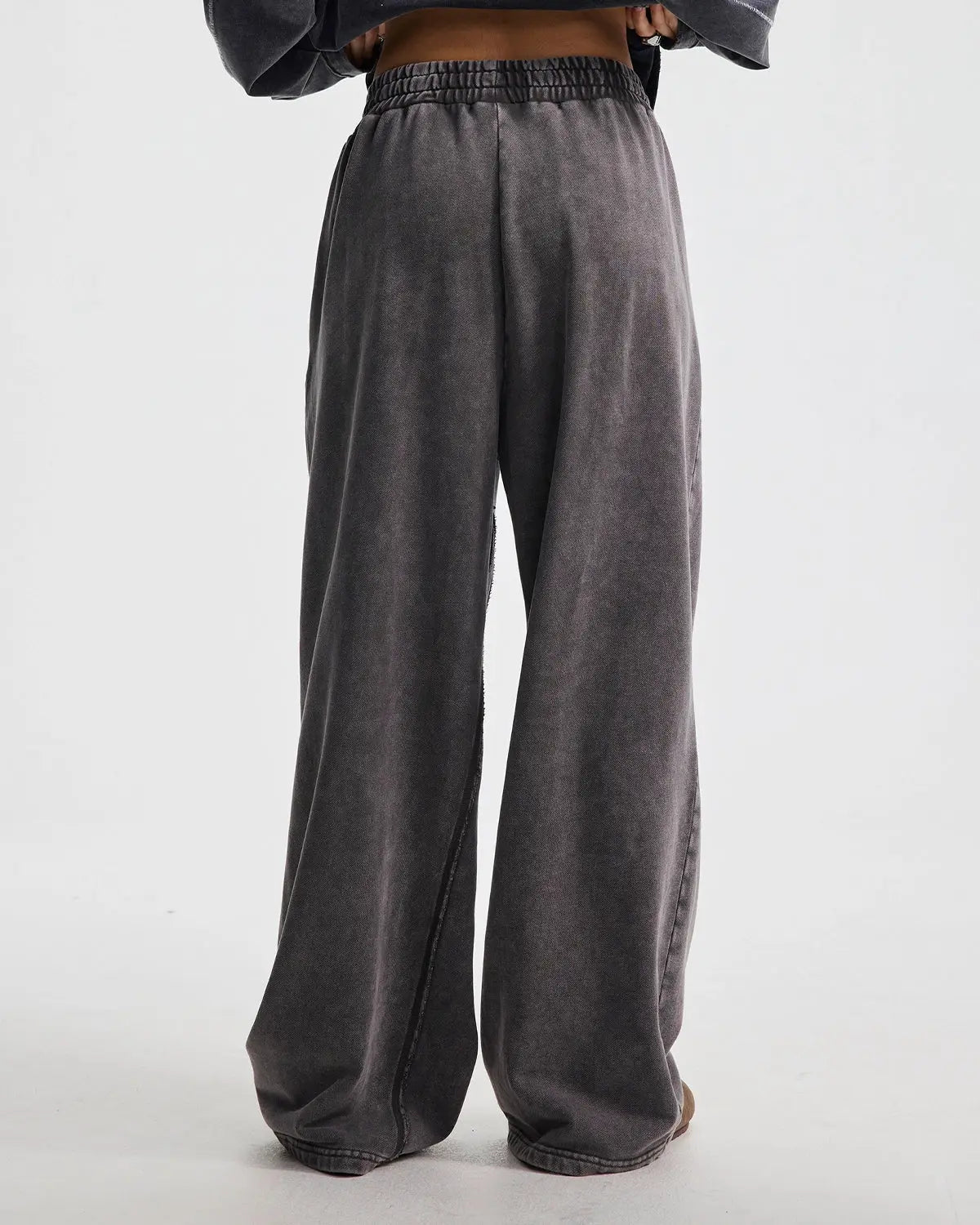 Inflation Streetwear straight leg acid wash sweatpants featuring a relaxed fit and casual style, shown in a neutral color.