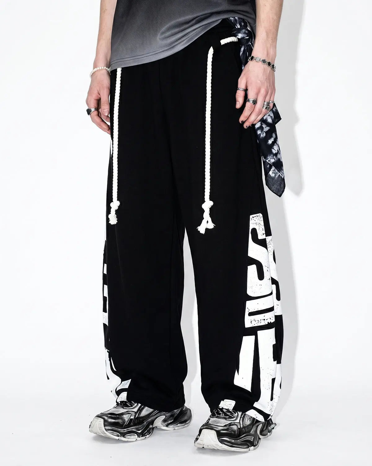 Inflation Streetwear Graphic Barrel Sweatpants with bold print, relaxed fit, and adjustable waistband on neutral background.