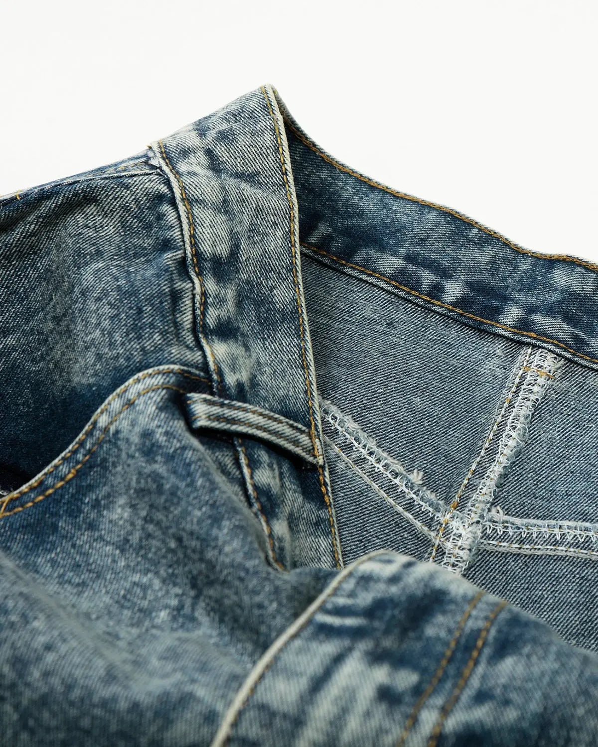 Rhinestone acid wash baggy jeans by INFLATION Streetwear with distressed details and relaxed fit, displayed on a mannequin.