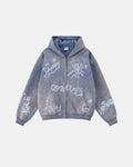 Inflation graffiti washed zip-up hoodie featuring colorful graffiti design on soft fabric, casual streetwear style.