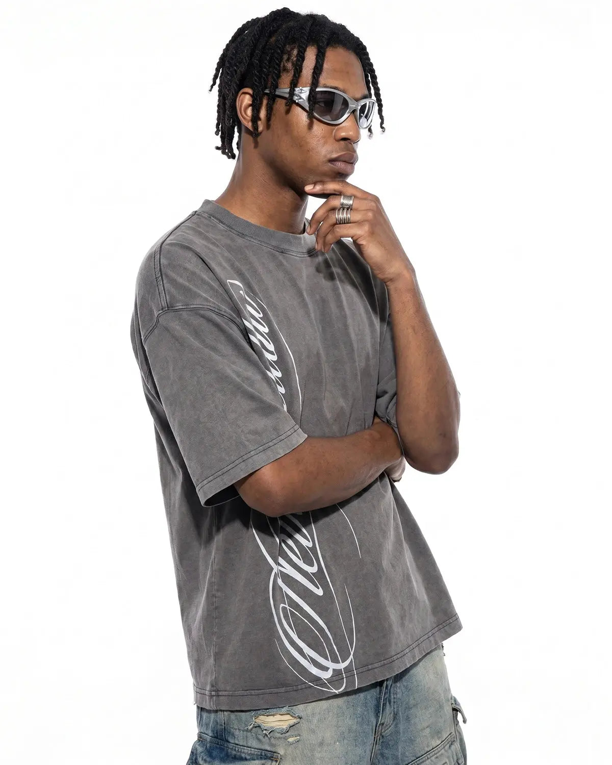 Inflation Streetwear boxy script graphic washed T-shirt featuring bold lettering on a casual, distressed fabric design.