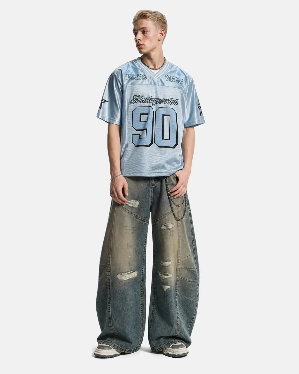 Inflation Streetwear mesh patchwork oversized jersey with mixed fabric panels and relaxed fit, featuring bold stitch details.
