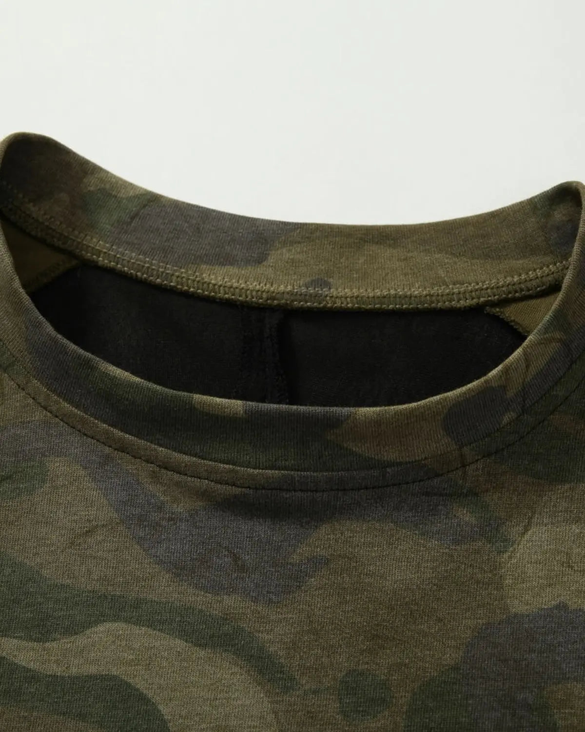Inflation Streetwear lace patchwork camo raglan tee featuring mixed lace and camouflage fabric with long sleeves and casual fit.