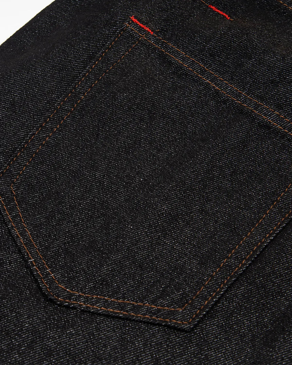 Asymmetric buckle raw baggy jeans by INFLATION featuring distressed denim and a loose fit, styled with casual streetwear appeal.