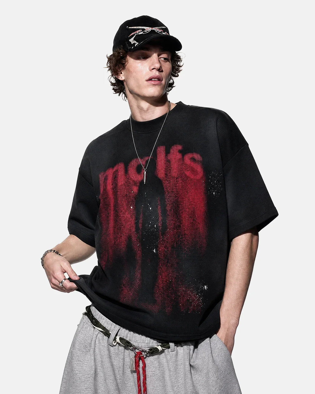 Black cotton T-shirt with Gothic letter print from INFLATION Streetwear, featuring bold, artistic gothic-style lettering on the front.