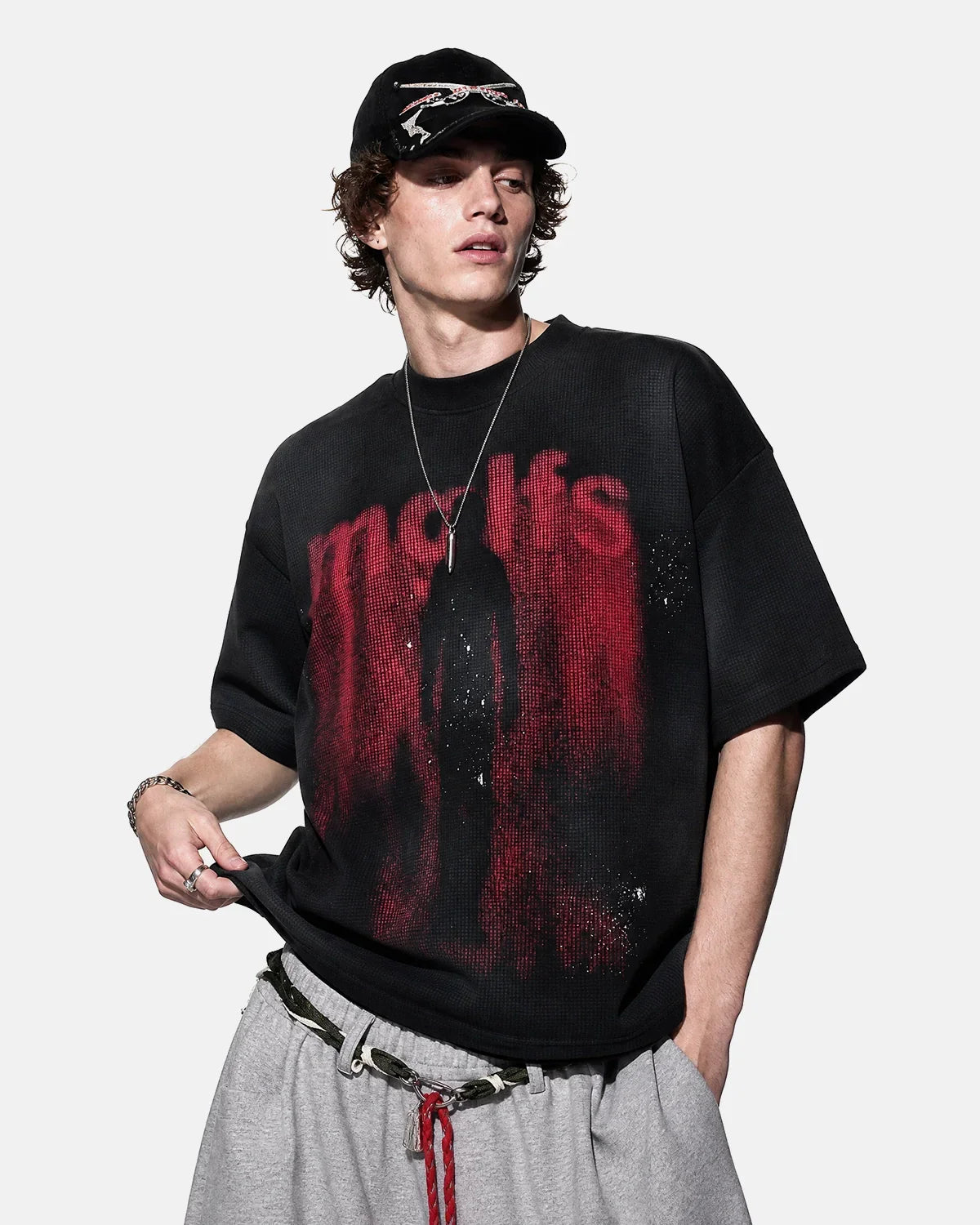 Black cotton T-shirt with Gothic letter print from INFLATION Streetwear, featuring bold, artistic gothic-style lettering on the front.