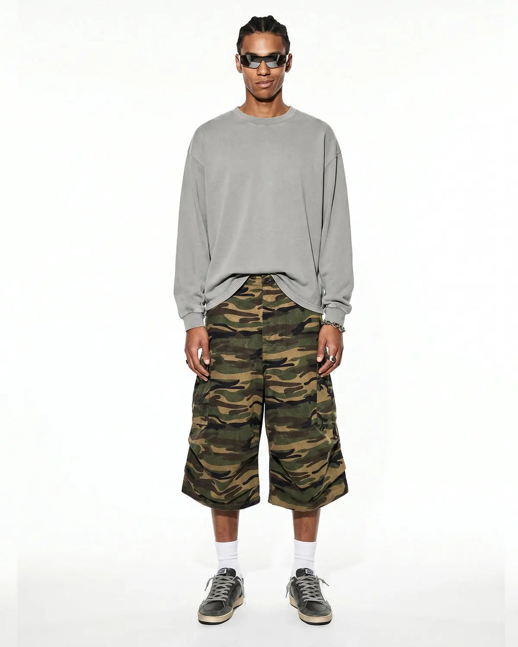 Distressed washed long sleeve tee shirt by INFLATION Streetwear, featuring a relaxed fit and vintage-style faded fabric.