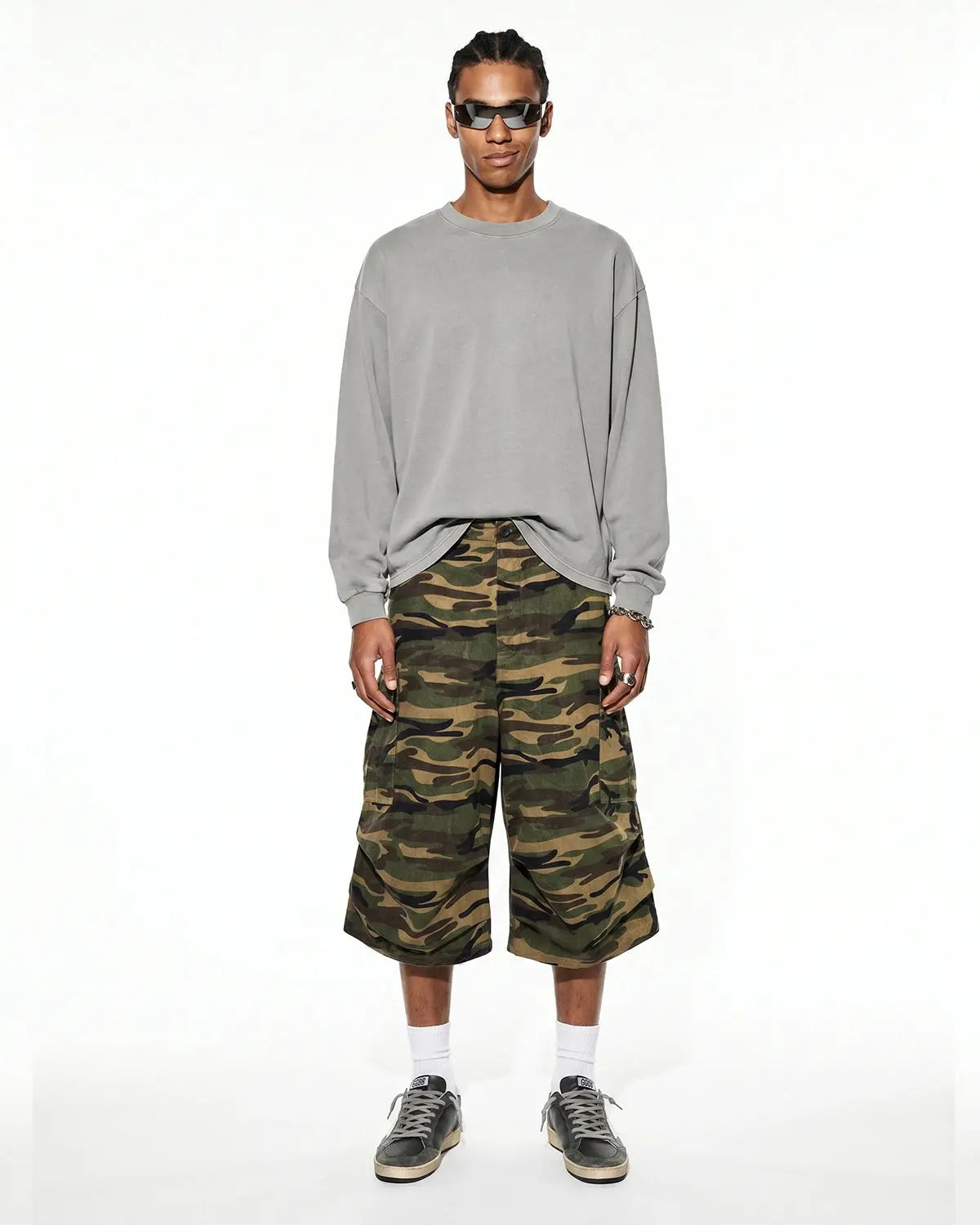 Distressed washed long sleeve tee shirt by INFLATION Streetwear, featuring a relaxed fit and vintage-style faded fabric.