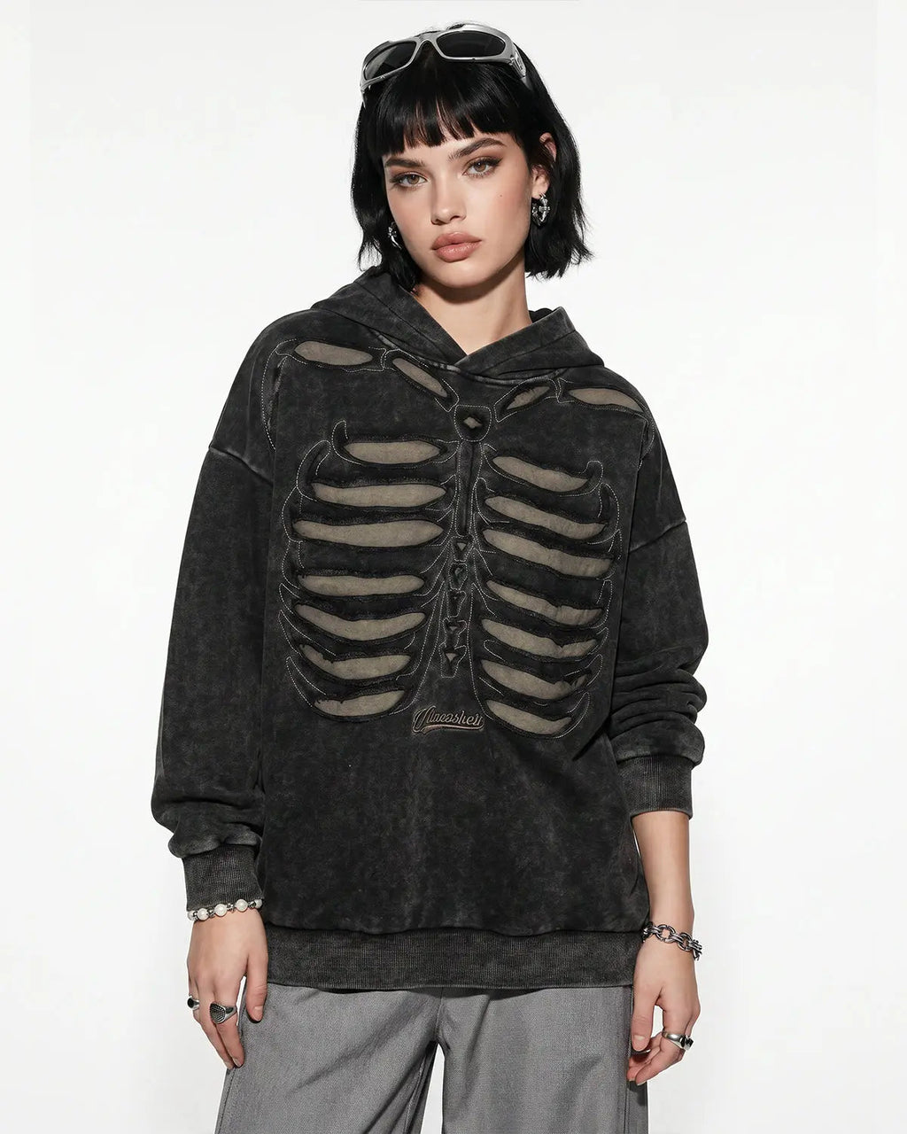Distressed ribcage wash hoodie by INFLATION Streetwear featuring a worn, vintage style with distressed details and casual fit.