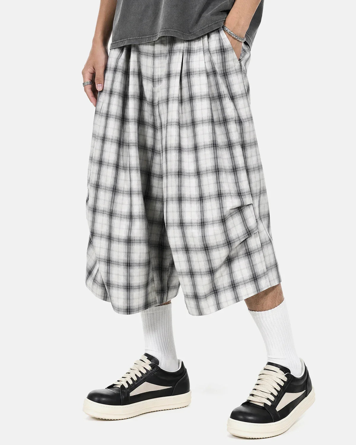 Inflation streetwear plaid longline casual shorts with a relaxed fit, featuring a red, black, and white checkered pattern.