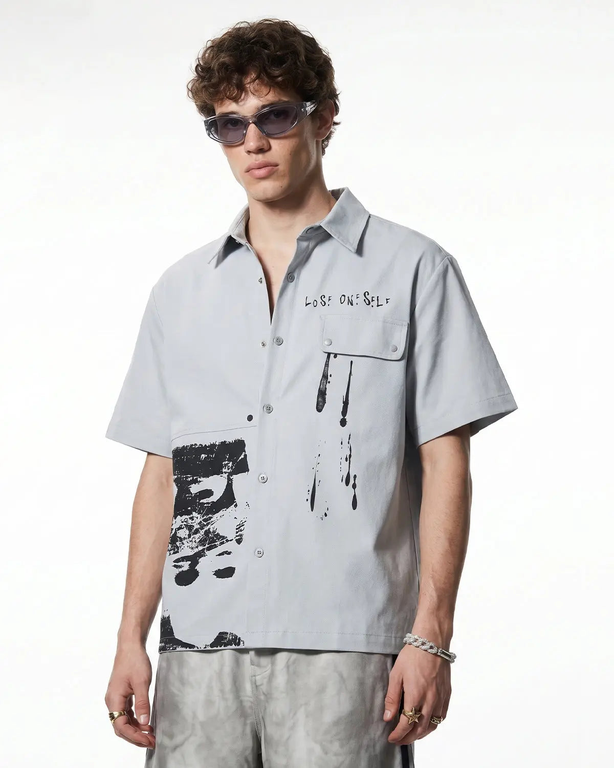 Abstract graphic printing shirt by INFLATION streetwear featuring bold, colorful designs on a casual shirt.