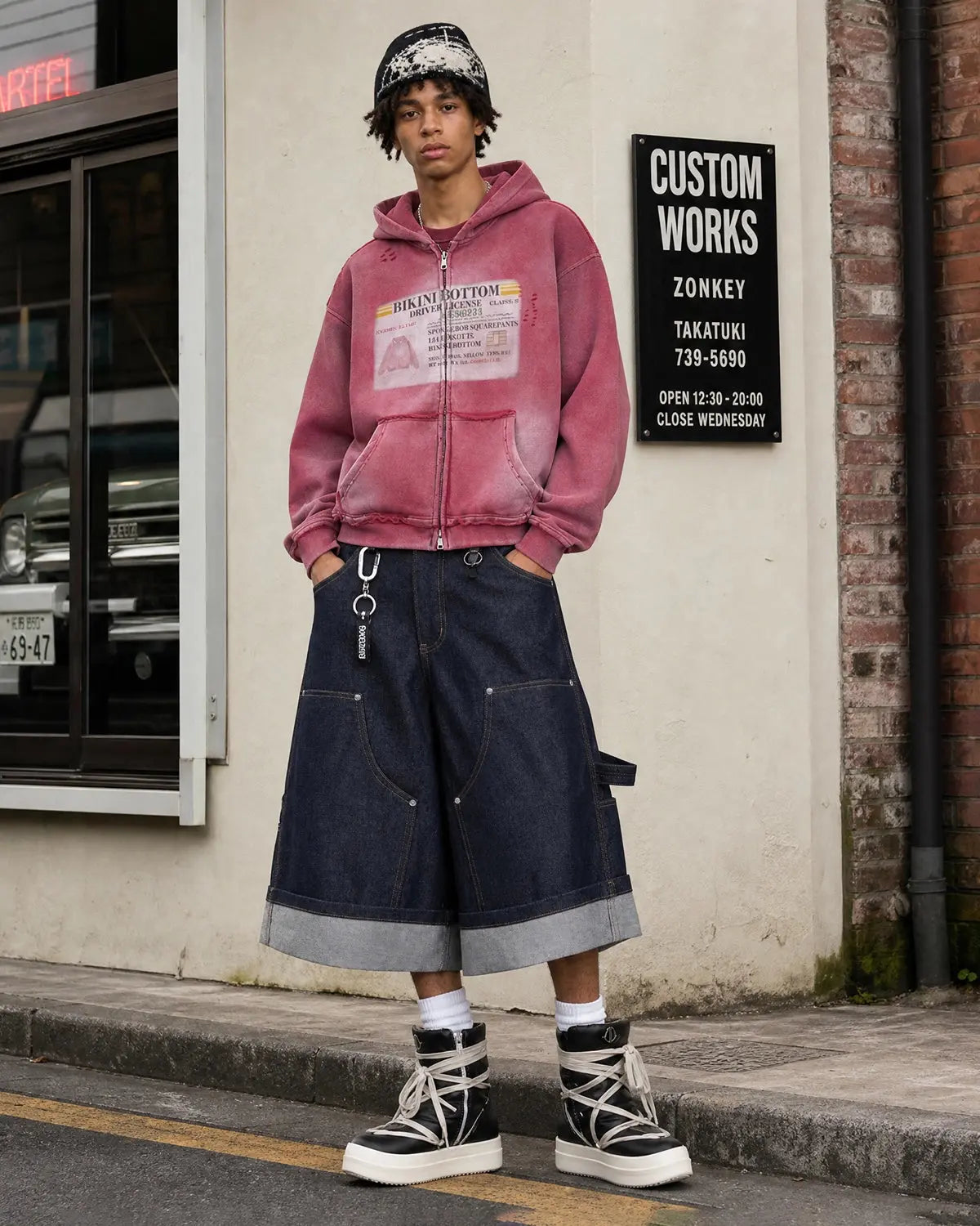 Inflation Streetwear graphic ripped washed zip-up hoodie with distressed details and a casual fit, shown in a front view.