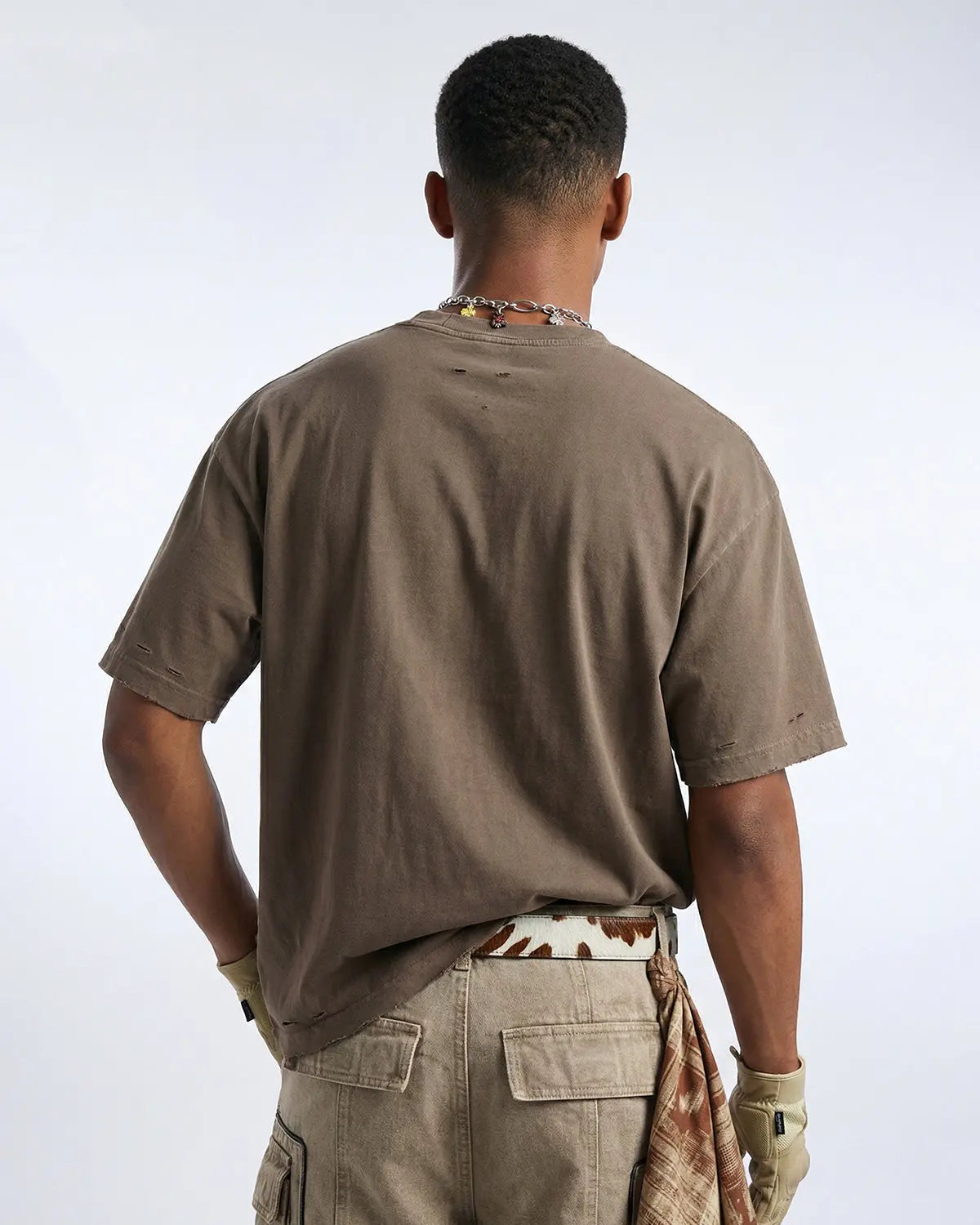 Inflation Streetwear ripped distressed washed oversized T-shirt with frayed edges and torn details, casual streetwear style.