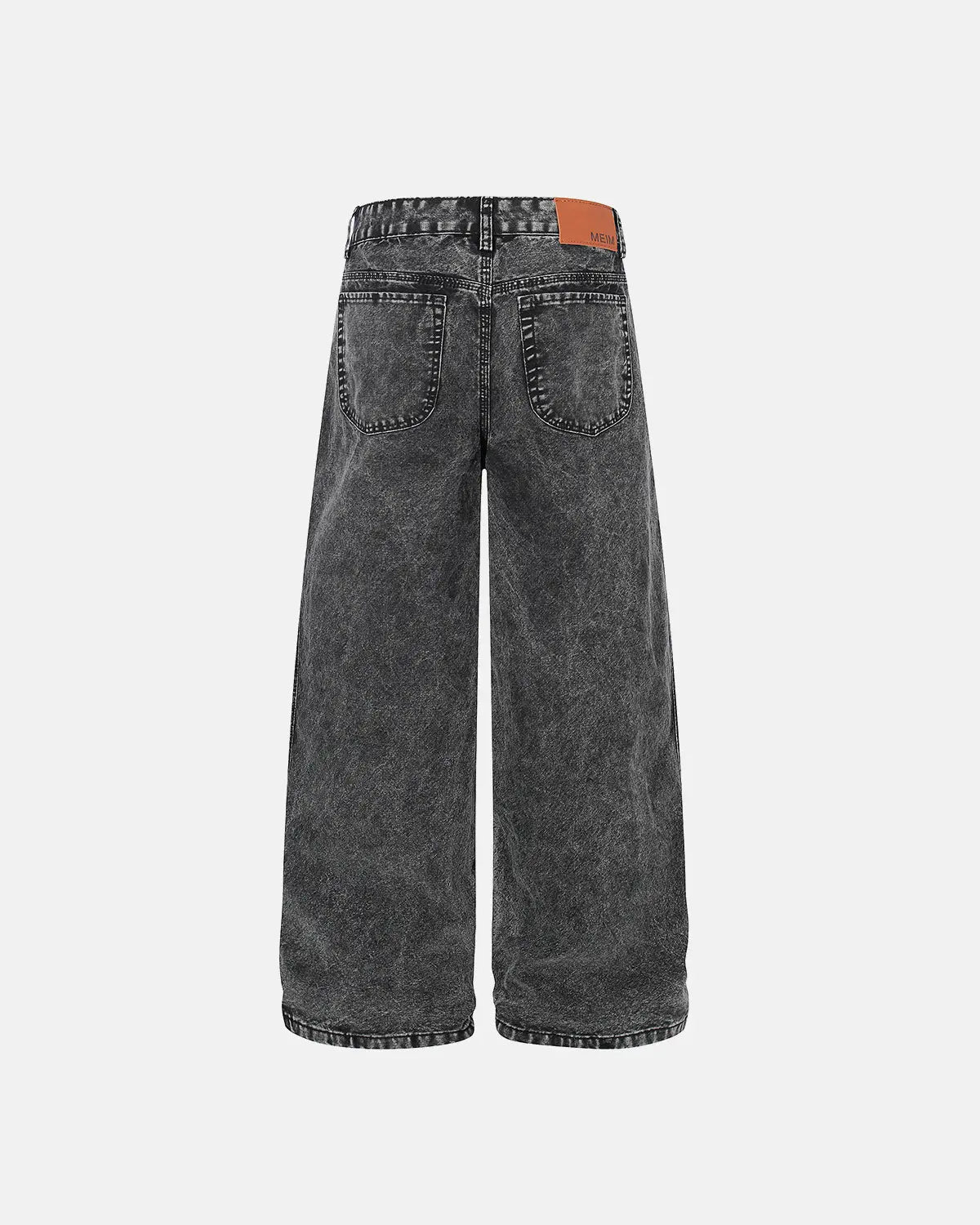 Deconstructed distressed barrel jeans by INFLATION featuring ripped details and a relaxed fit, styled with casual streetwear.