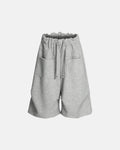 Baggy Sweat Shorts by INFLATION, stylish streetwear pants with a relaxed fit, featuring soft fabric and casual design.