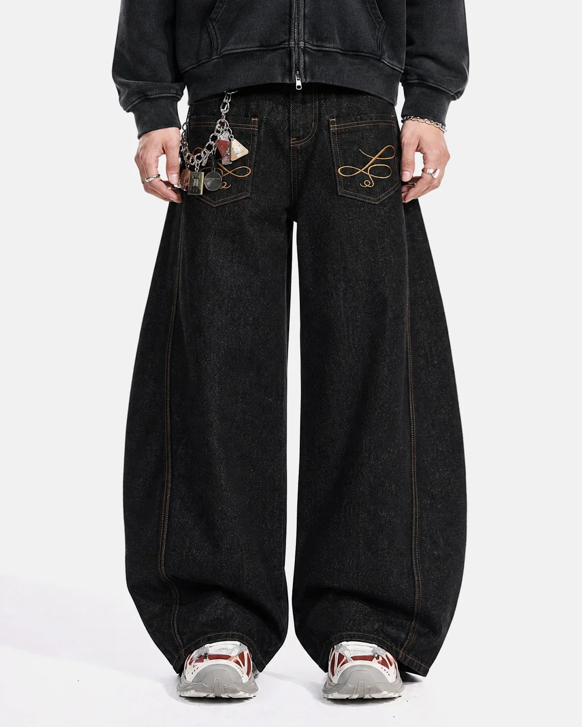 Inflation Streetwear Pocket Embroidery Raw Barrel Jeans showing detailed embroidery on the front pockets and raw hem design.