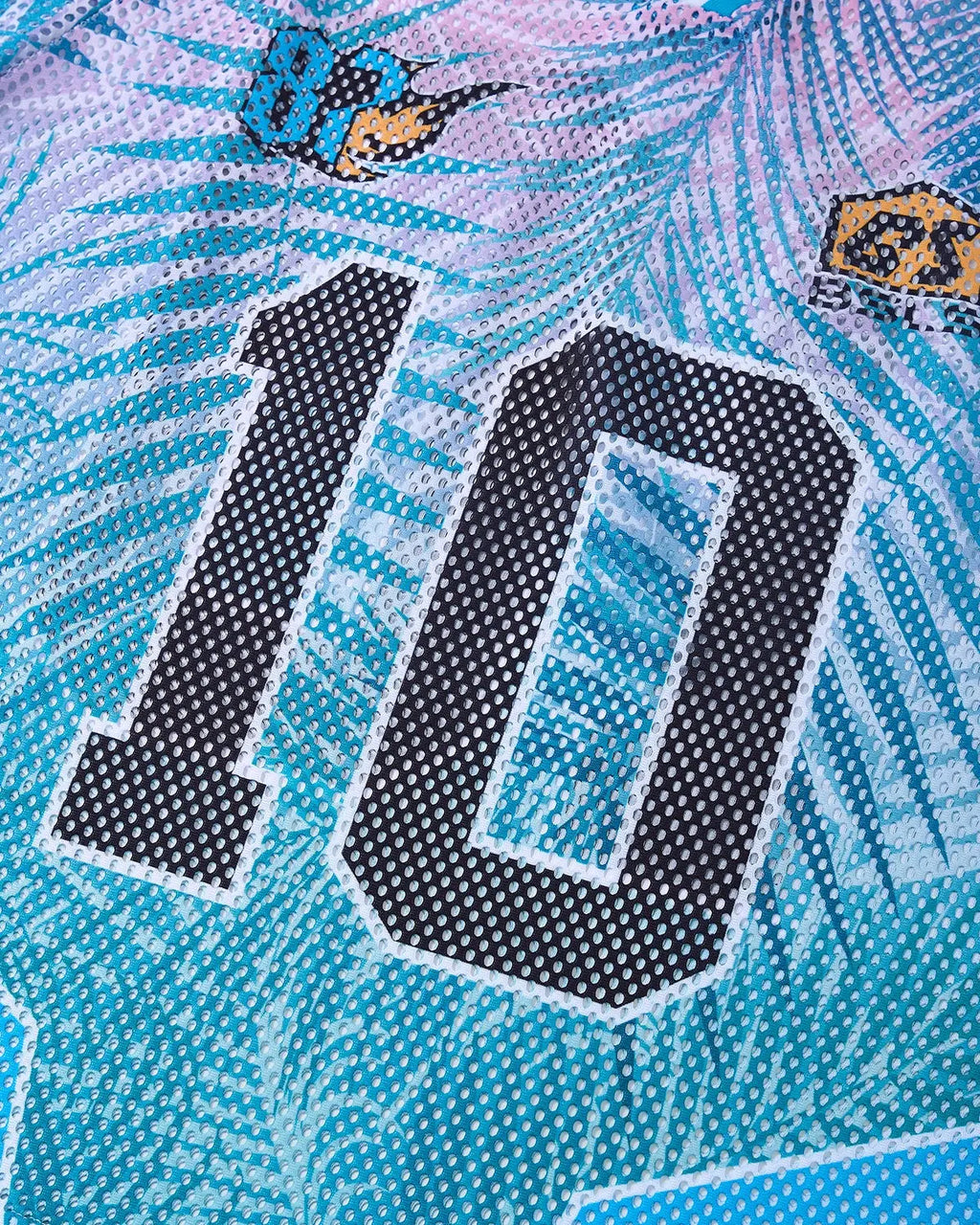 Oversized mesh football jersey by INFLATION, featuring breathable fabric and bold streetwear style.