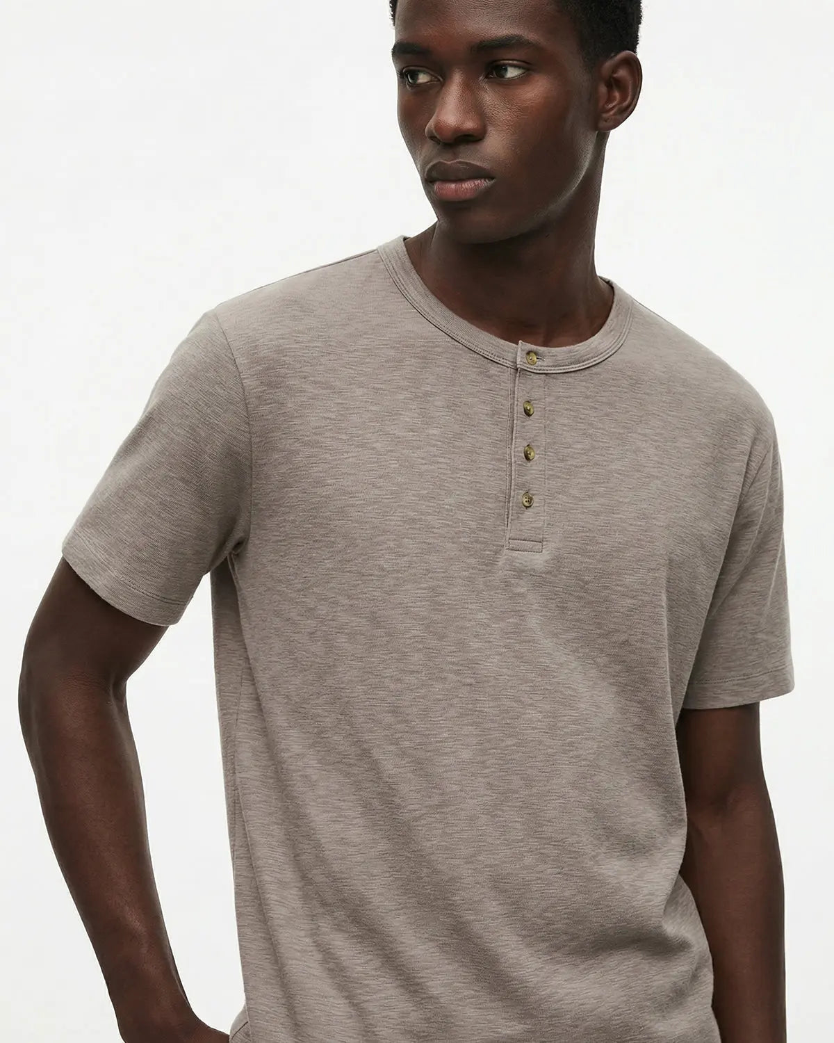 Old Money Relaxed Henley T-Shirt by INFLATION, casual black T-shirt with a relaxed fit and buttoned neckline, front view.