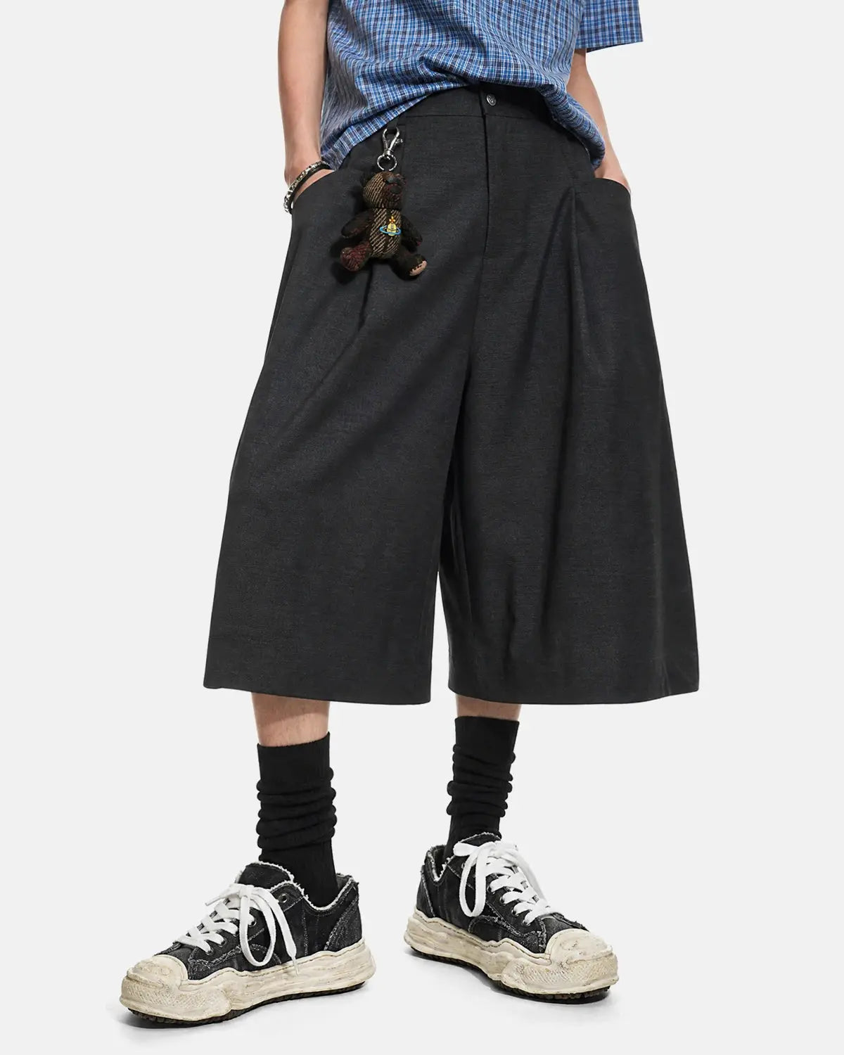 Inflation Streetwear pleated wide-leg tailored shorts in beige fabric, featuring a relaxed fit and high waist design.