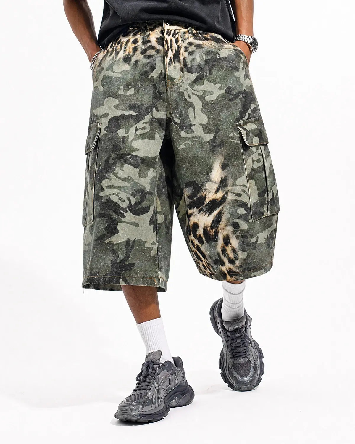Leopard camo cargo longline shorts by INFLATION Streetwear, featuring camouflage pattern, cargo pockets, and a longer fit style.