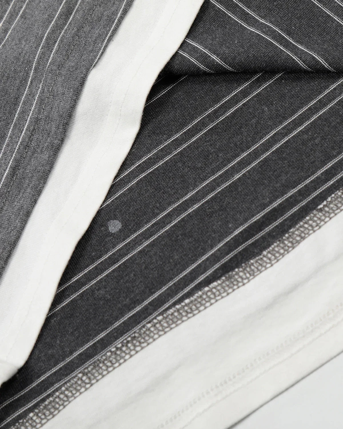 Layered Henley Stripe T-Shirt by INFLATION, featuring a casual striped design with layered neckline and relaxed fit.