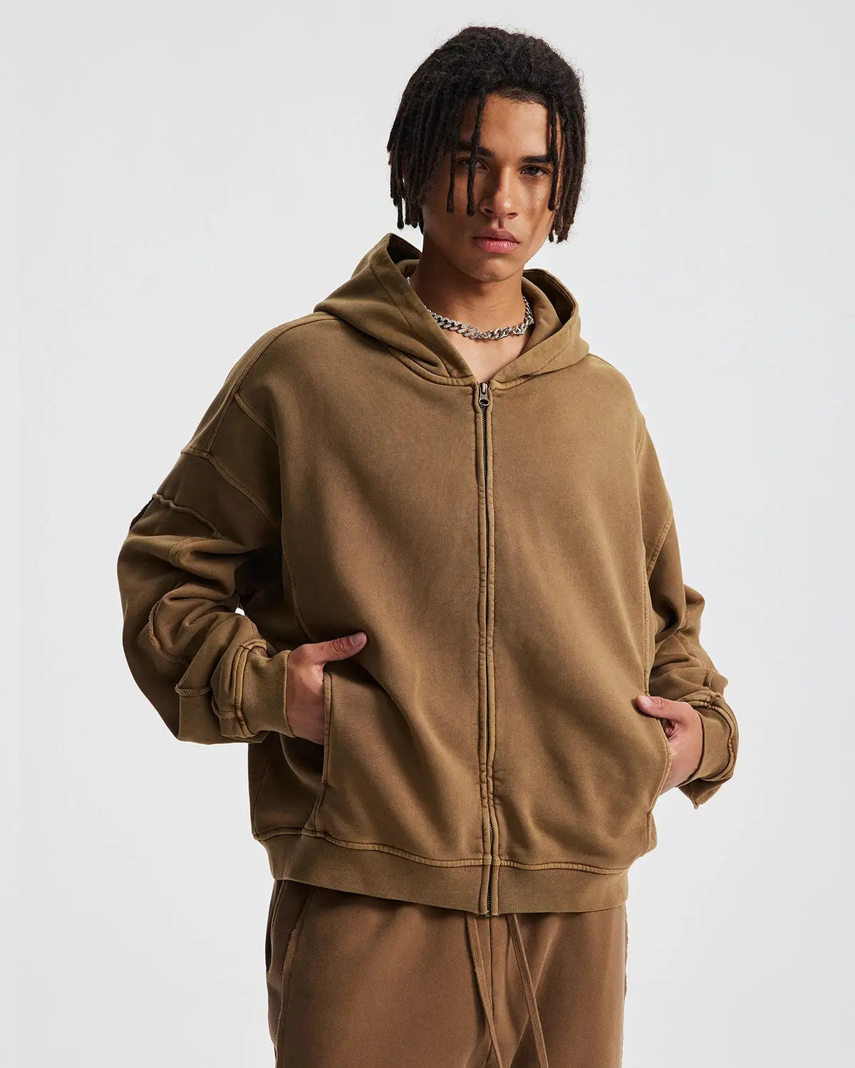 Inflation Streetwear acid wash zip-up hoodie with stitching details, featuring a casual fit and front zipper.