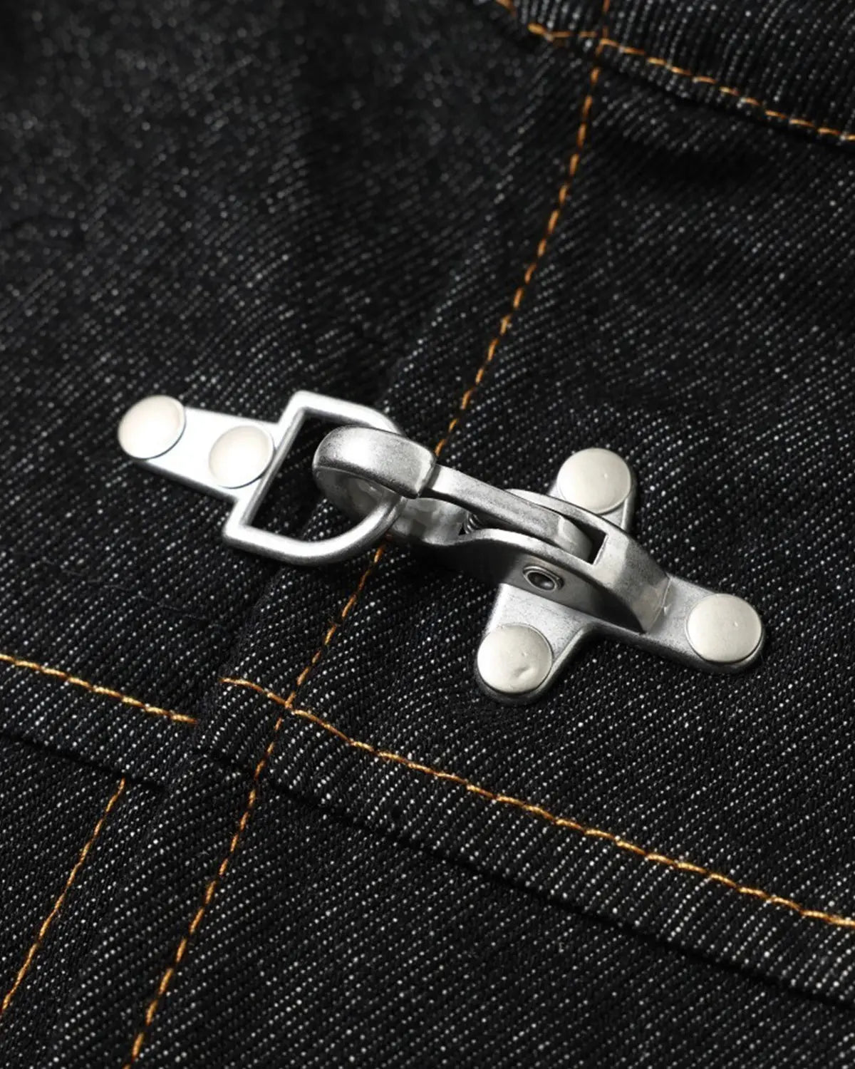 Metal toggle raw denim jacket by INFLATION, stylish streetwear with metal accents and classic raw denim fabric.