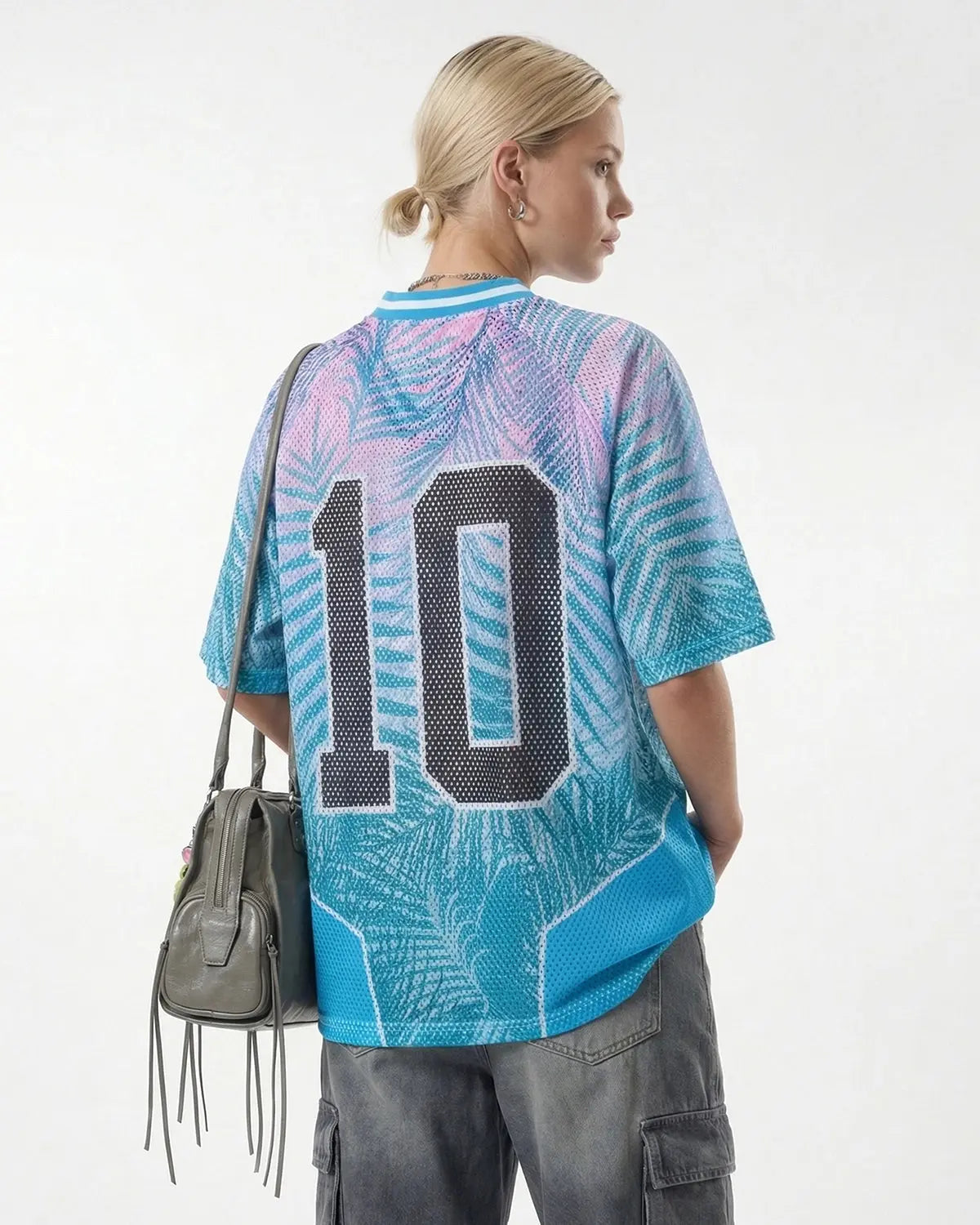 Oversized mesh football jersey by INFLATION featuring breathable fabric, bold design, and athletic style for streetwear fashion.