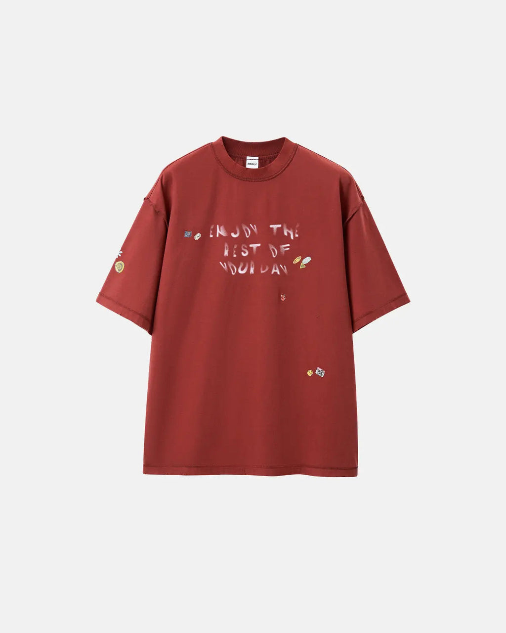 Vintage sticker graphic oversized T-shirt from INFLATION Streetwear featuring a bold, colorful design on soft cotton fabric