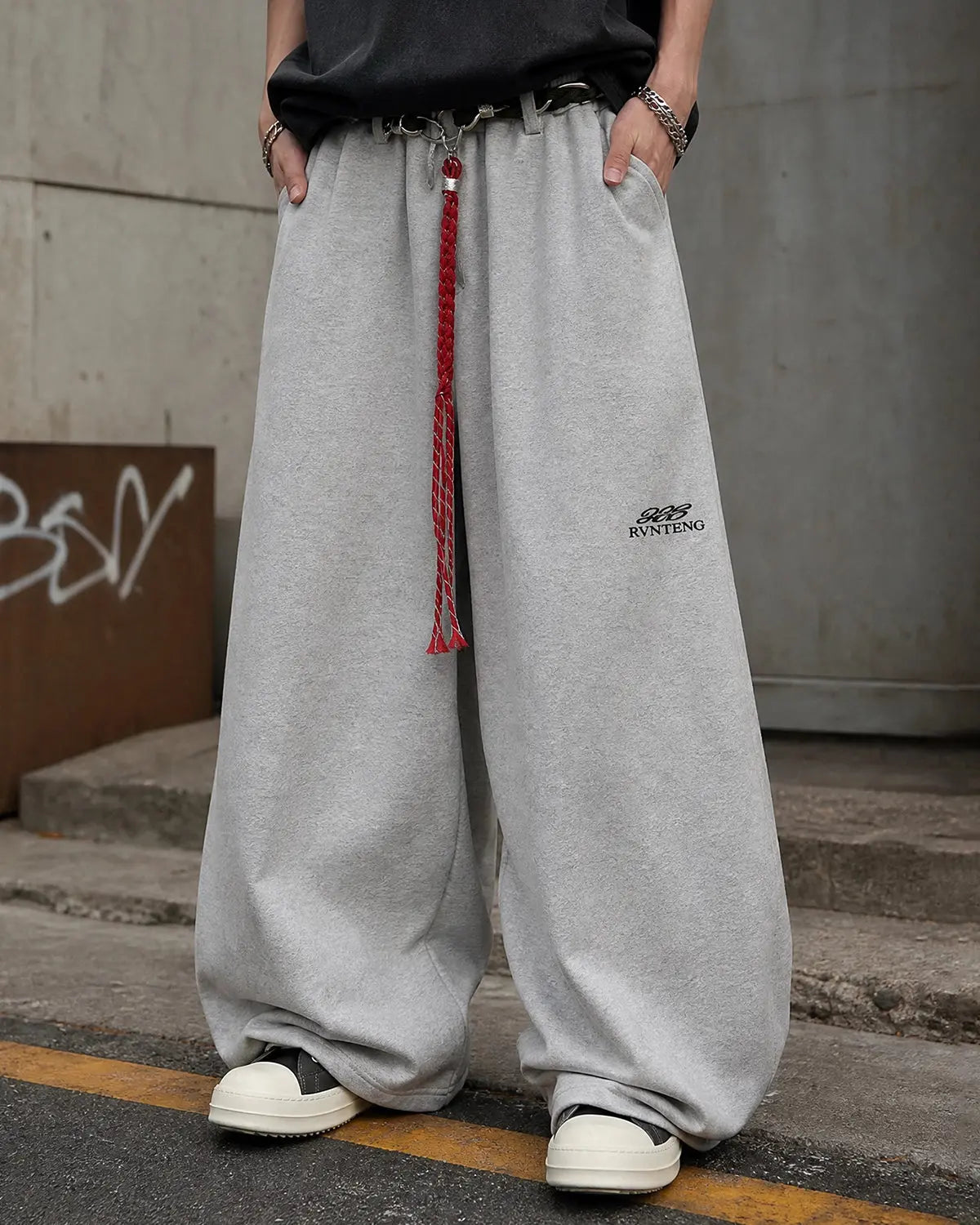 Inflation brand baggy wide leg sweatpants with adjustable waistband, casual streetwear style and relaxed fit.