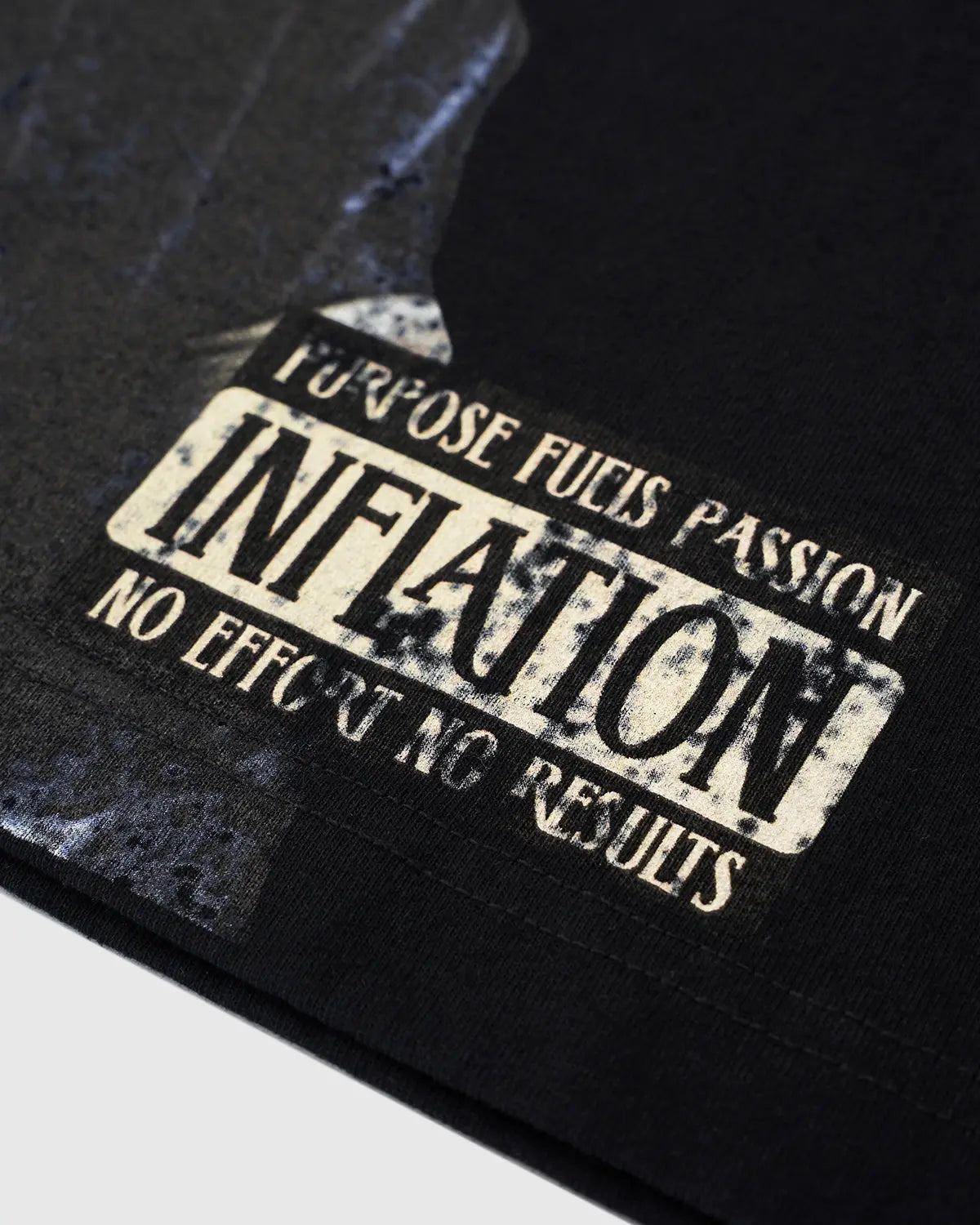 Washed boxy graphic tee from INFLATION streetwear collection, featuring bold printed design on soft cotton fabric.