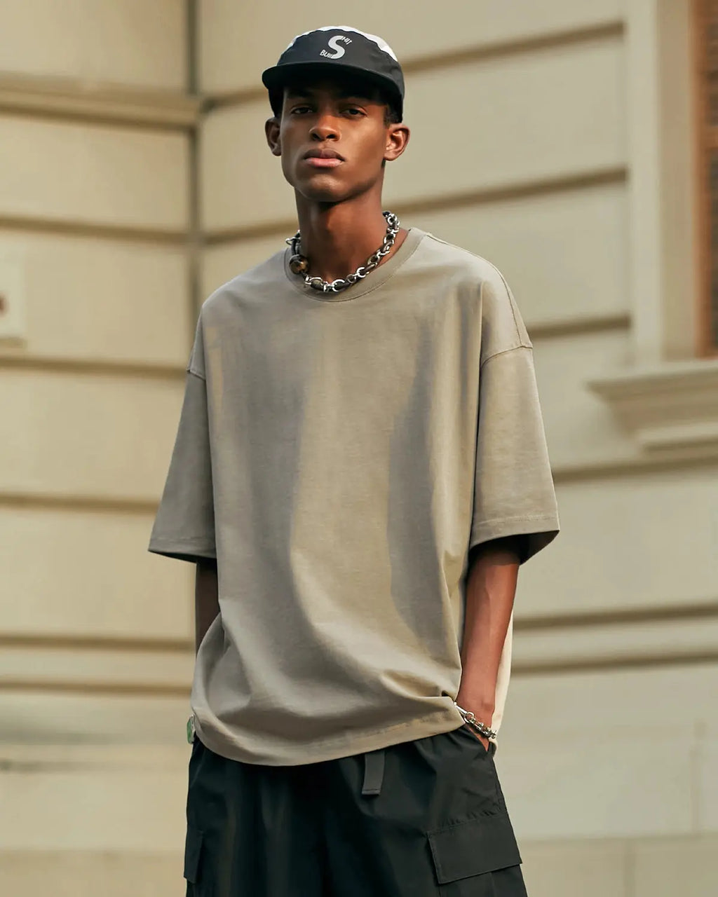 Inflation Heavyweight Cotton Oversized T-Shirt in neutral color, featuring a relaxed fit and minimal branding on the front.