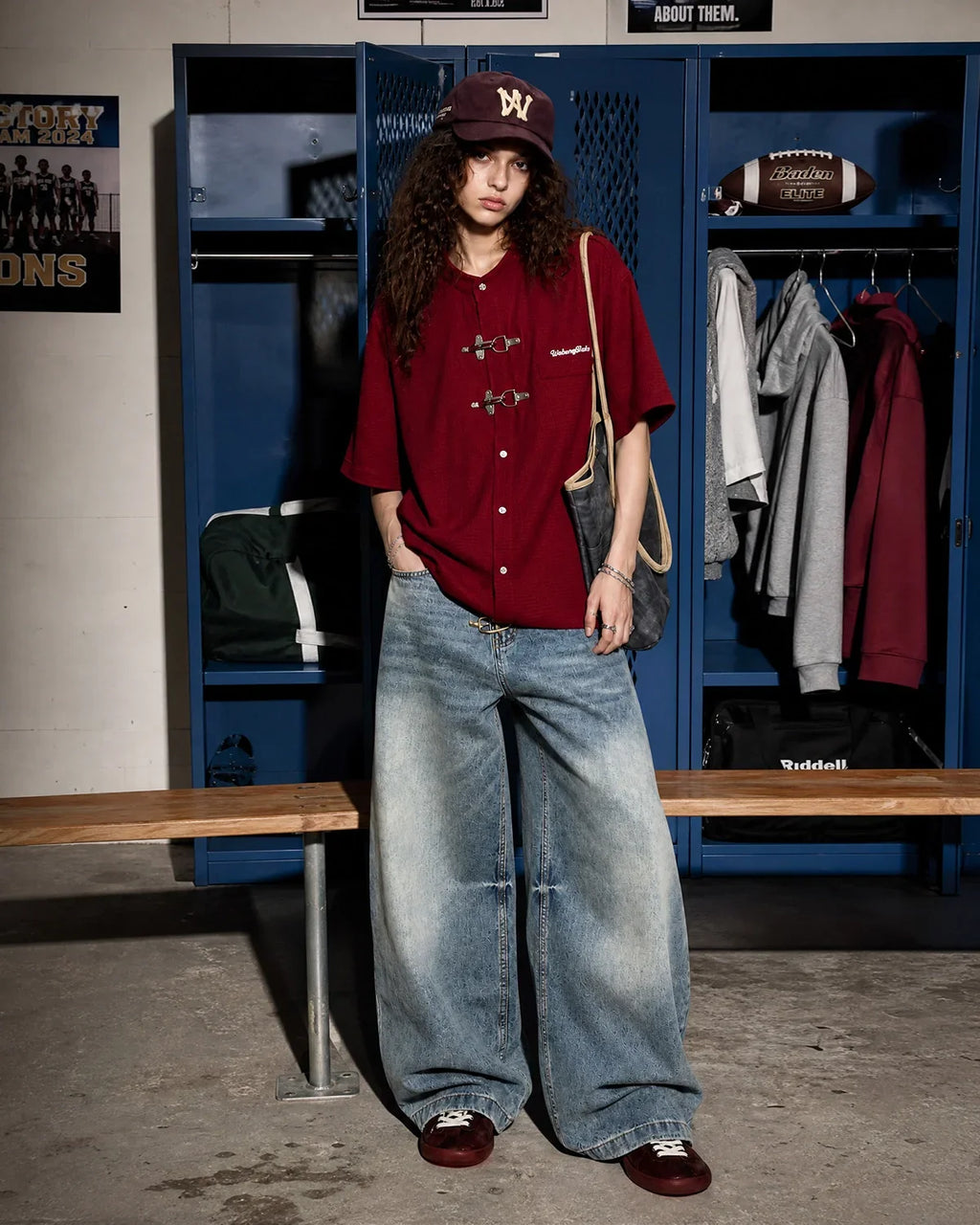Asymmetric buckle denim overalls jeans by INFLATION, featuring distressed details, casual fit, and stylish streetwear design.