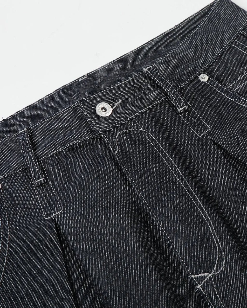 Inflation Streetwear contrast stitching raw baggy jeans showing distressed denim and loose fit with prominent stitching details.