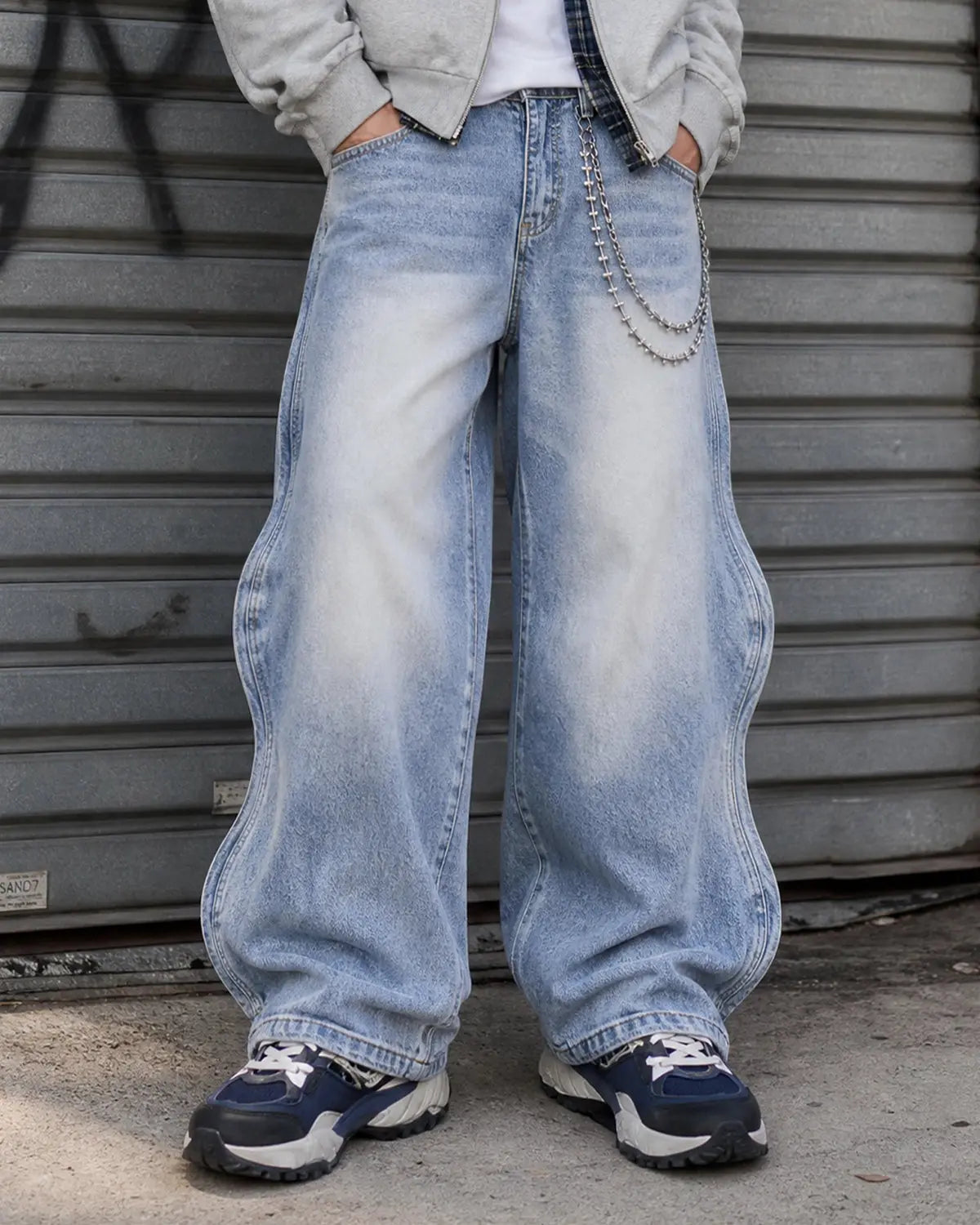 INFLATION Wave Washed Baggy Jeans showing relaxed fit, distressed details, and washed denim texture in a casual pants style.