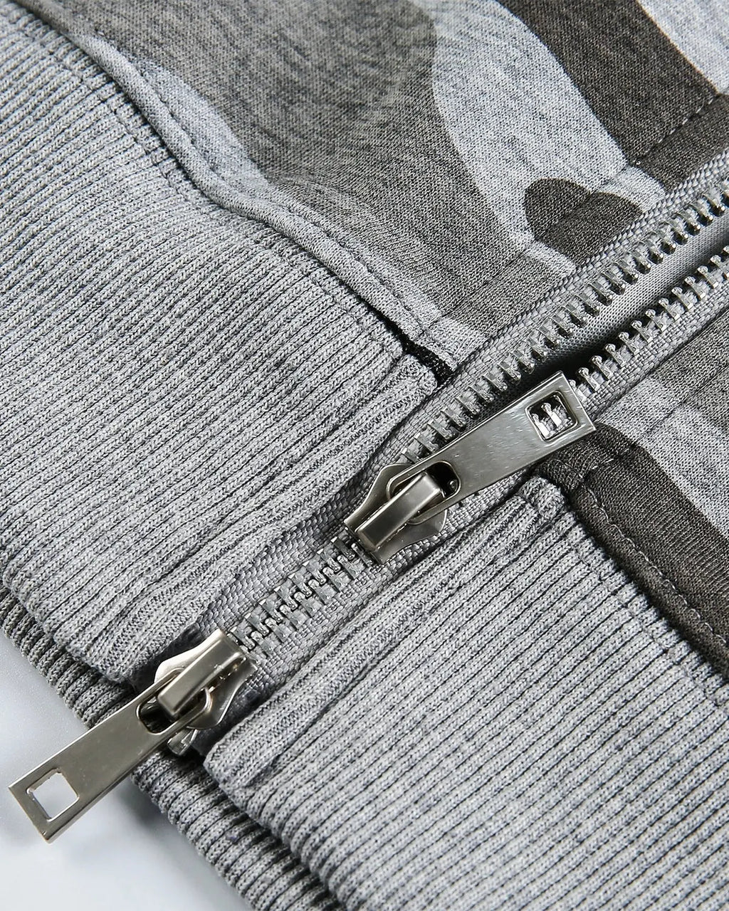Inflation Streetwear cropped camouflage zip-up hoodie with adjustable hood and front pockets, stylish urban streetwear look.