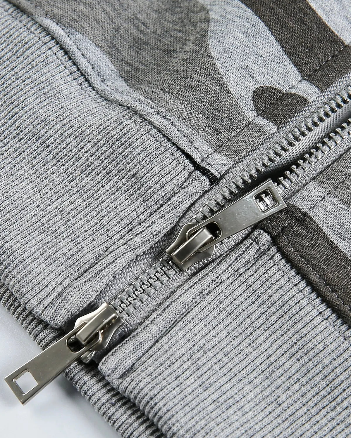 Inflation Streetwear cropped camouflage zip-up hoodie with adjustable hood and front pockets, stylish urban streetwear look.