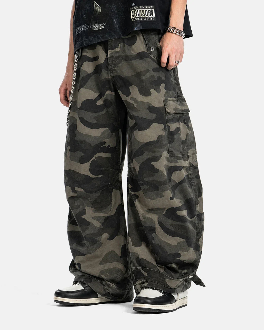 Inflation Multi-pockets Camo Barrel Cargo Pants with side and front pockets, showing durable fabric and stylish streetwear design.