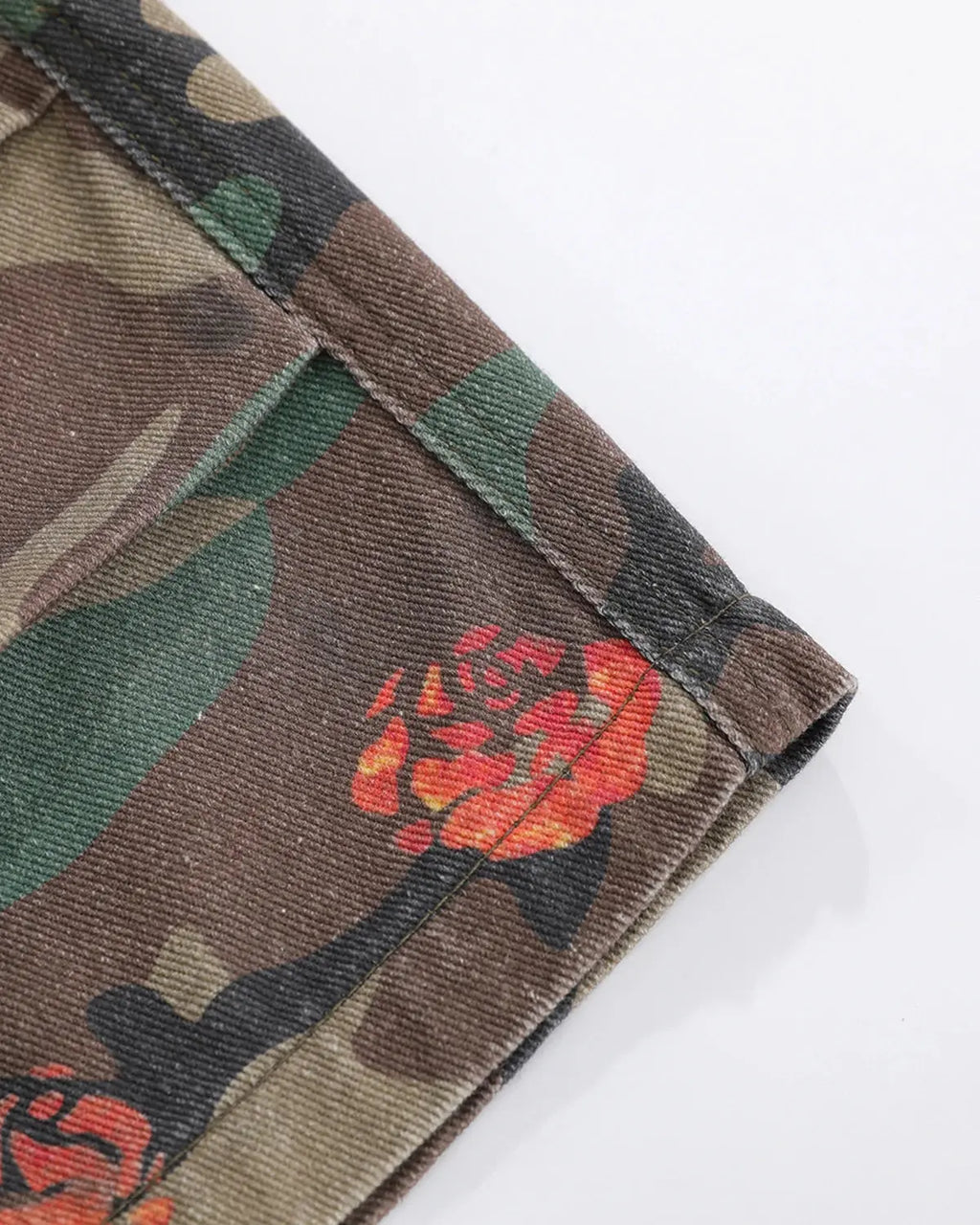 Inflation Floral Camo Cargo Longline Shorts featuring a mix of floral and camouflage patterns, with multiple pockets and a relaxed fit.