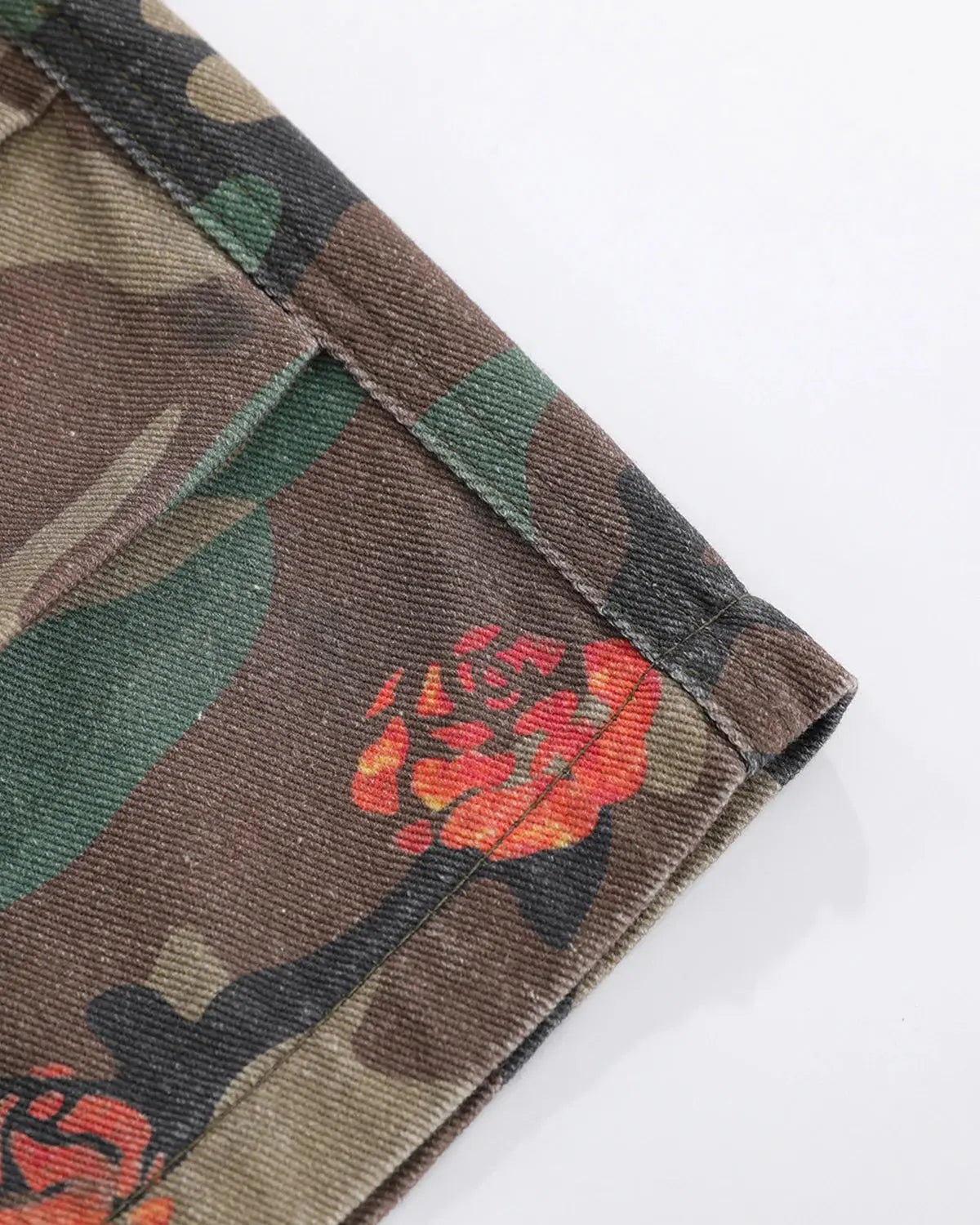 Inflation Floral Camo Cargo Longline Shorts featuring a mix of floral and camouflage patterns, with multiple pockets and a relaxed fit.