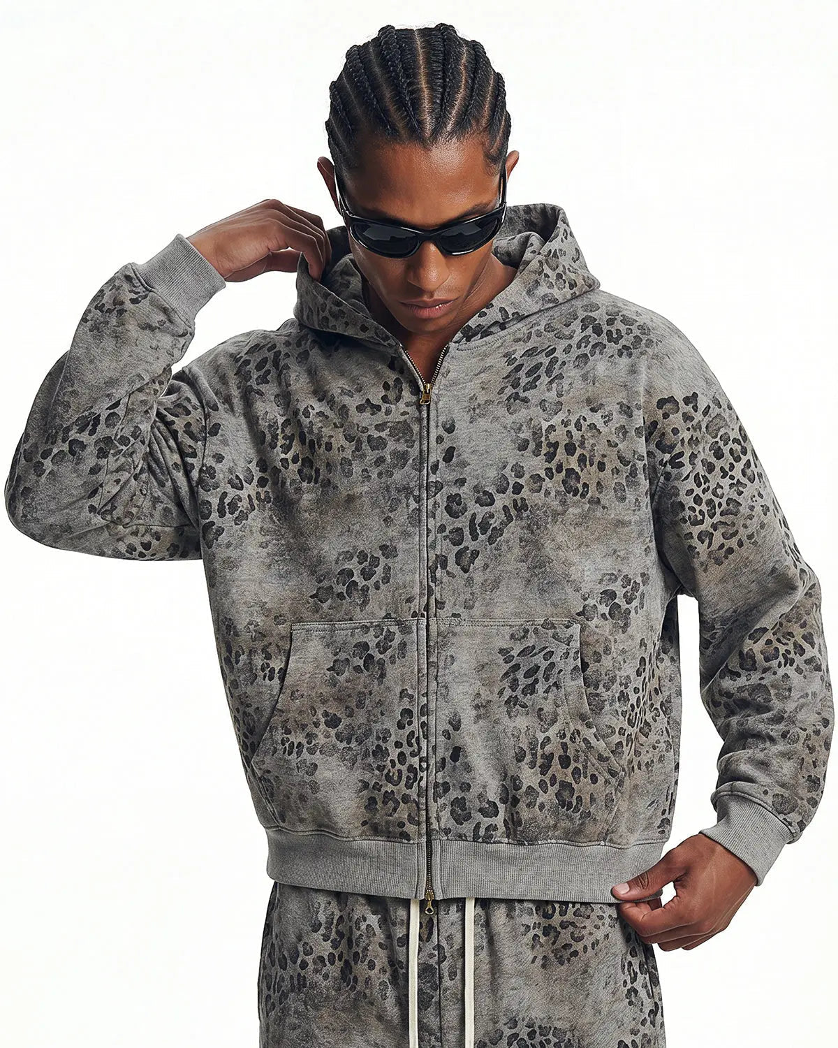 Leopard print boxy zip-up hoodie by INFLATION Streetwear, featuring a bold animal print design and front zipper closure.