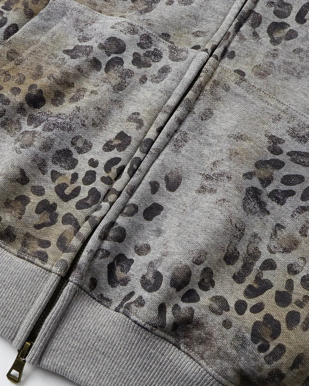 Leopard print boxy zip-up hoodie by INFLATION, featuring a front zipper, hood, and bold animal pattern on soft fabric.