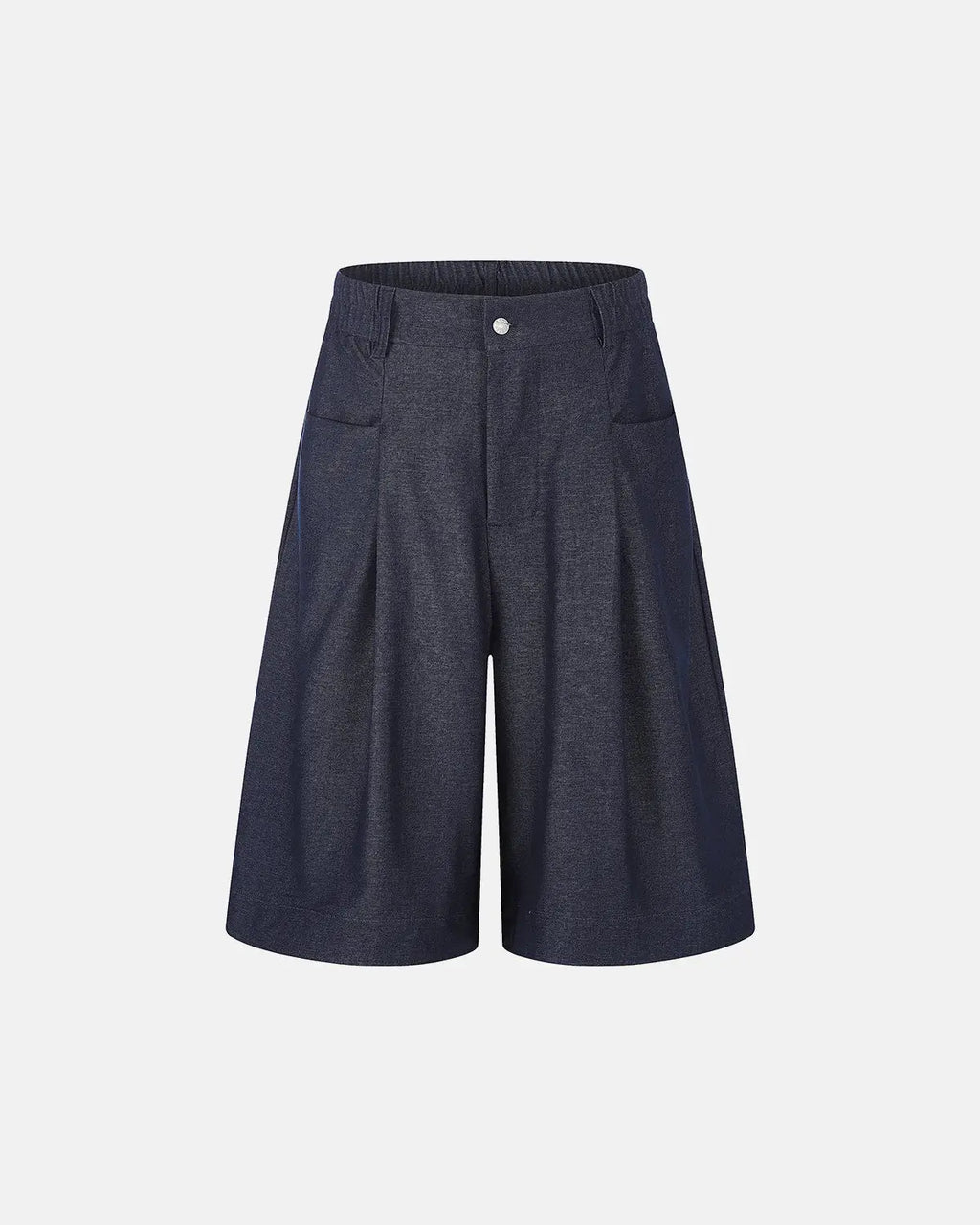 Inflation Streetwear pleated wide-leg tailored shorts with a high waist and relaxed fit, shown on a model against a neutral background.
