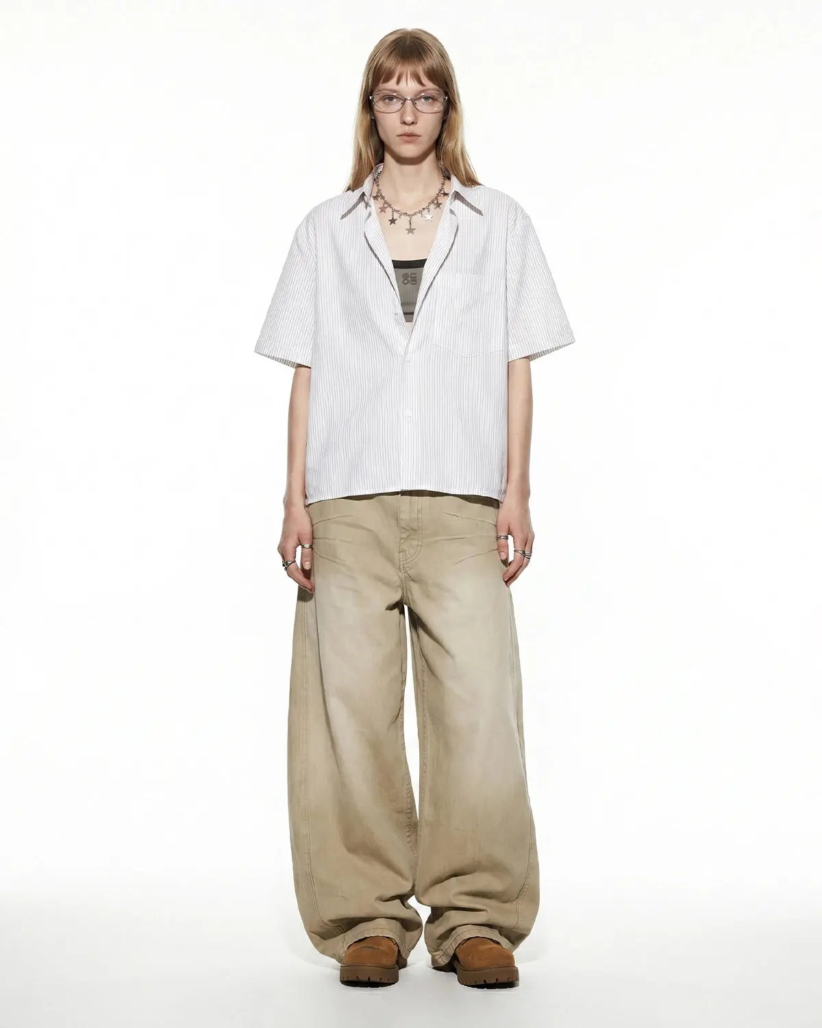 Inflation Streetwear boxy striped short-sleeve shirt with a relaxed fit and bold horizontal stripes in various colors.
