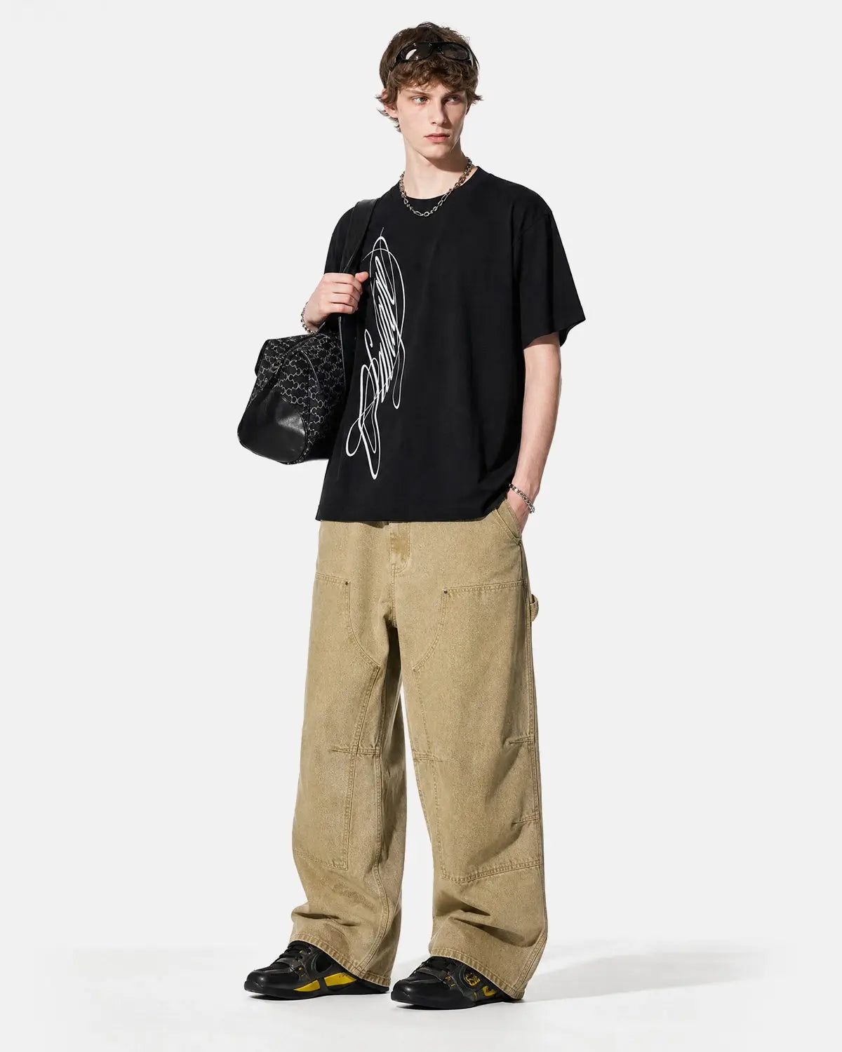 Inflation Streetwear Script Graphic Oversized T-Shirt featuring bold text design and relaxed fit in casual streetwear style.