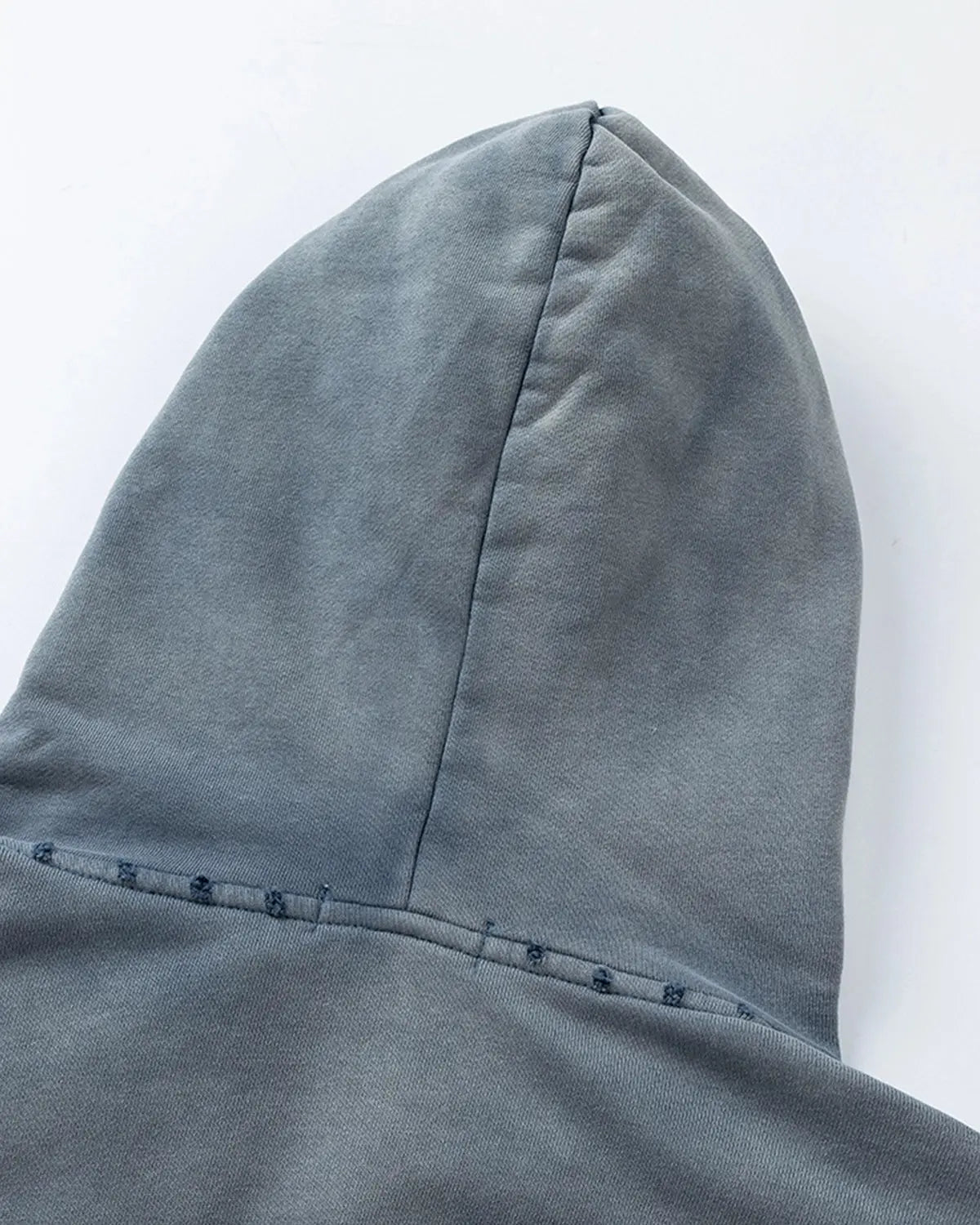 Blue distressed acid wash zip-up hoodie from INFLATION Streetwear, featuring a casual fit and front zipper detail.