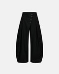 Asymmetric pleated barrel-leg suit pants by INFLATION, featuring a modern streetwear design with unique pleats and tailored fit.