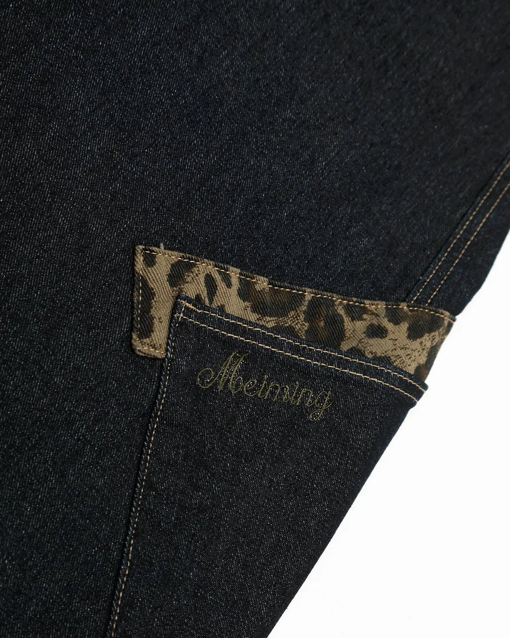 Leopard patchwork barrel jeans by Inflation Streetwear featuring bold leopard print and relaxed fit denim style.
