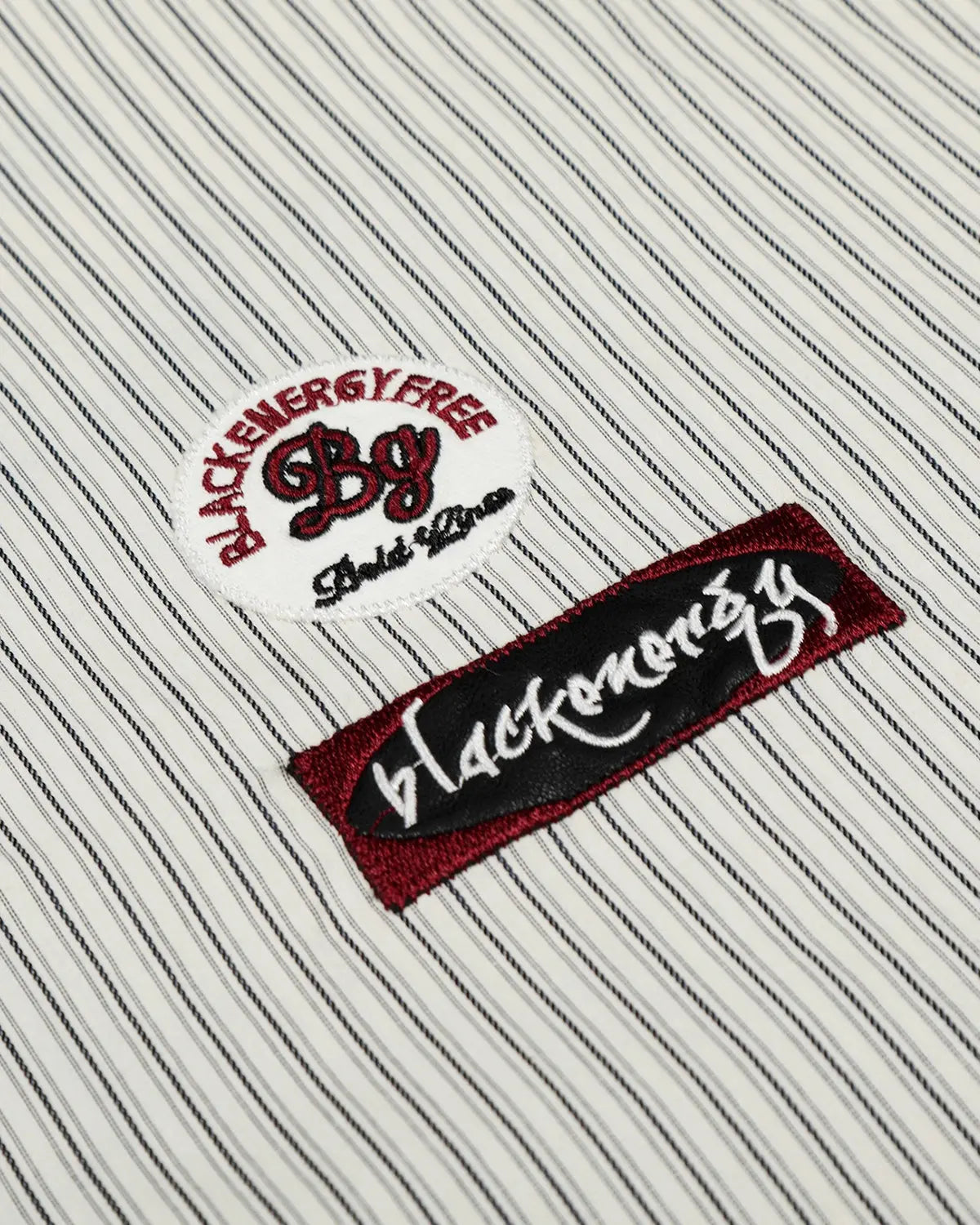 Inflation Streetwear graffiti patch striped shirt with bold colors and urban style, featuring patch details and casual fit.